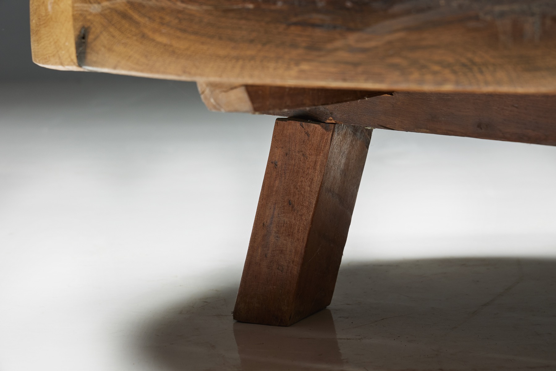 Rustic round coffee table in wood artisan style