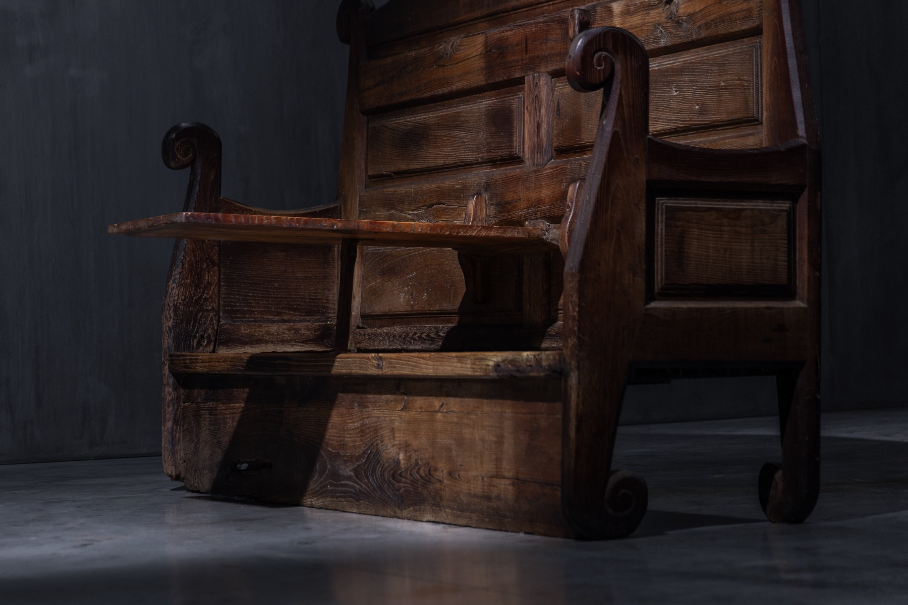 Timeworn 19th century monastic seating with table