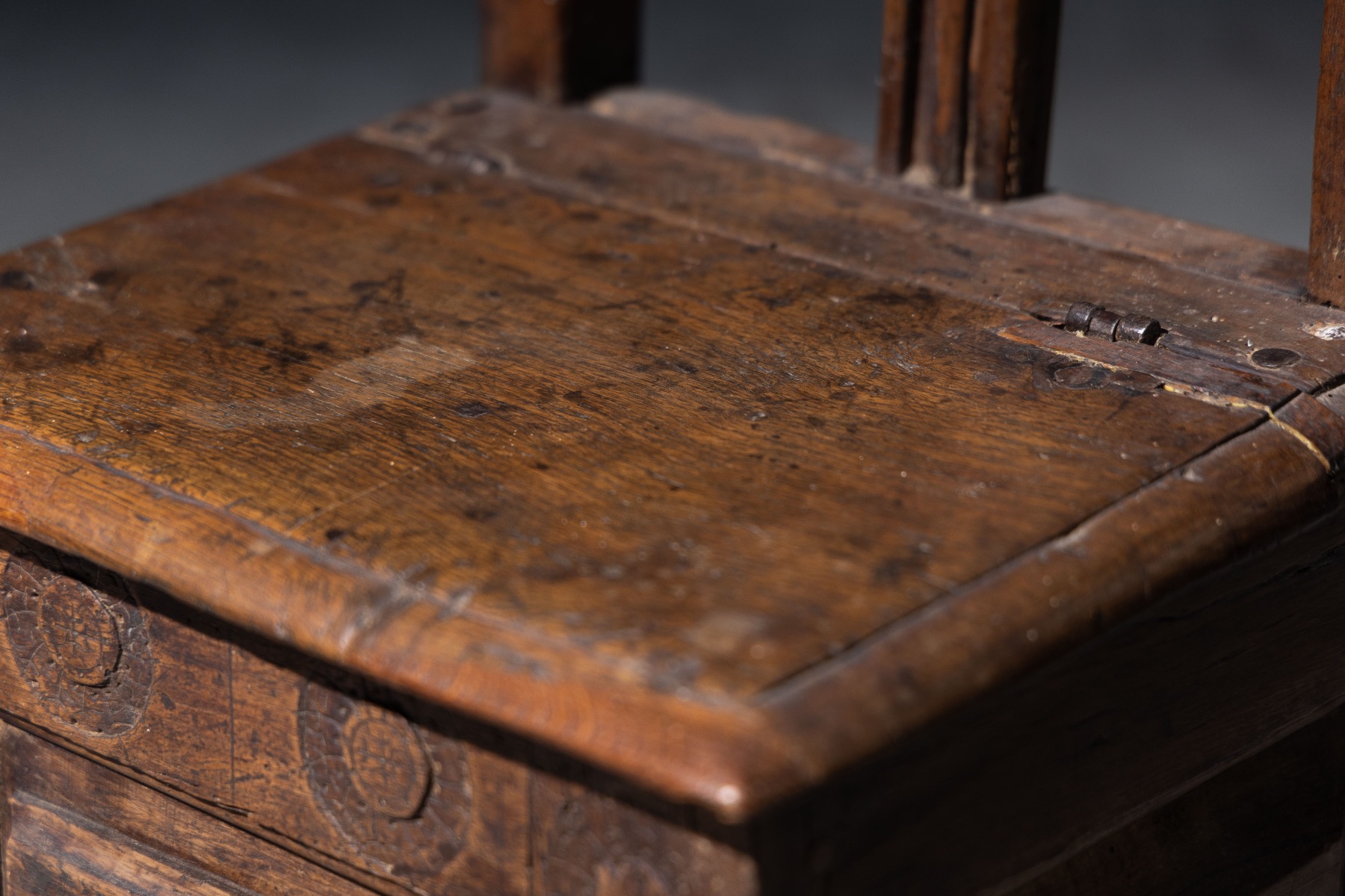 Timeworn rustic storage chair with aged patina
