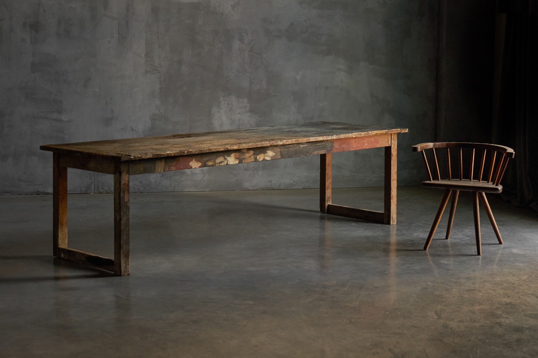 Utilitarian primitive dining table with honest proportions