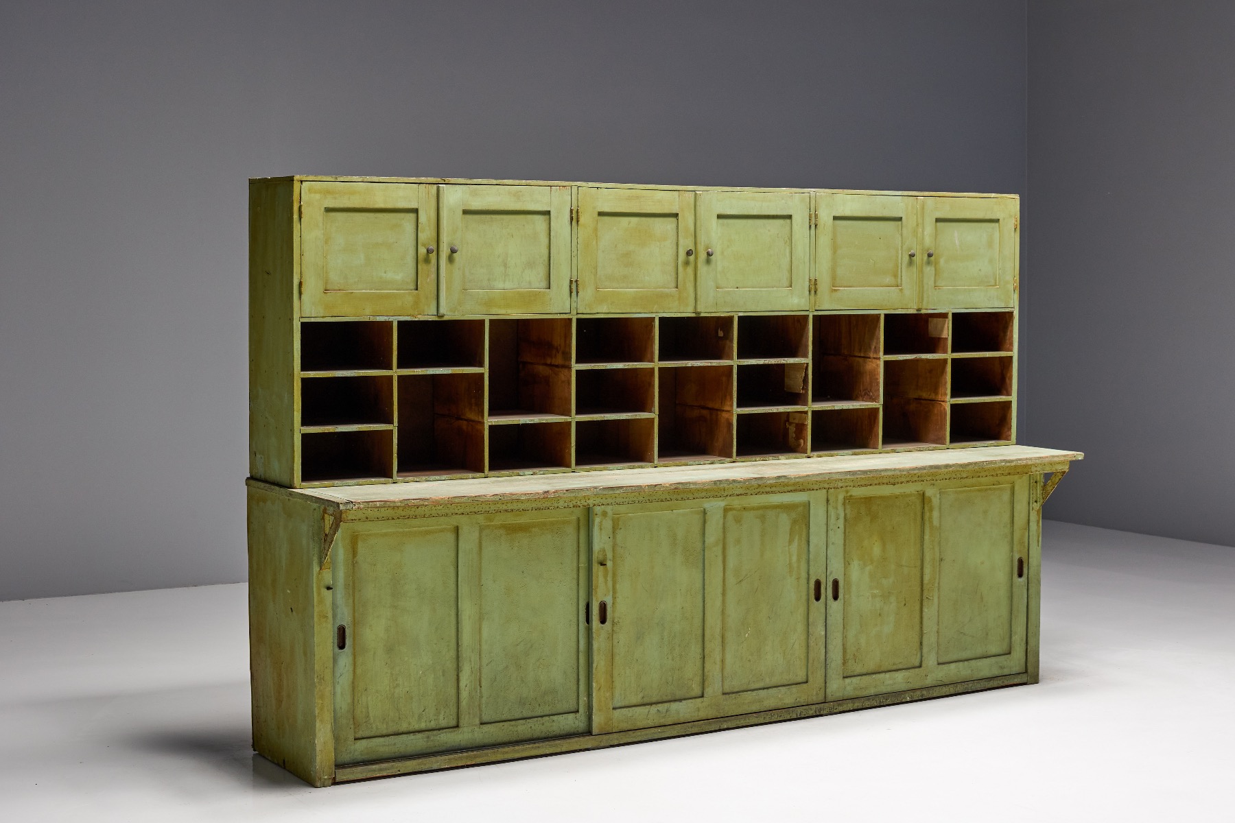 Aged solid wood green apothecary cabinet