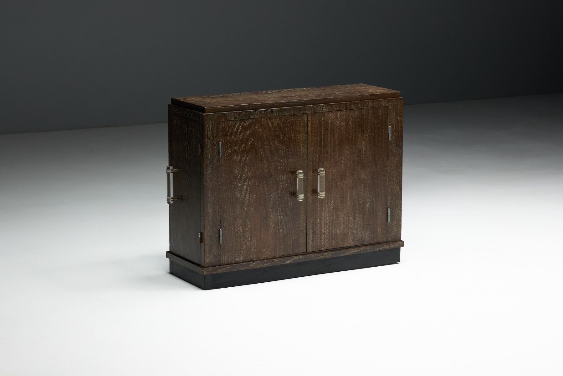 Oak wood Art Deco cabinet with sculptural design language