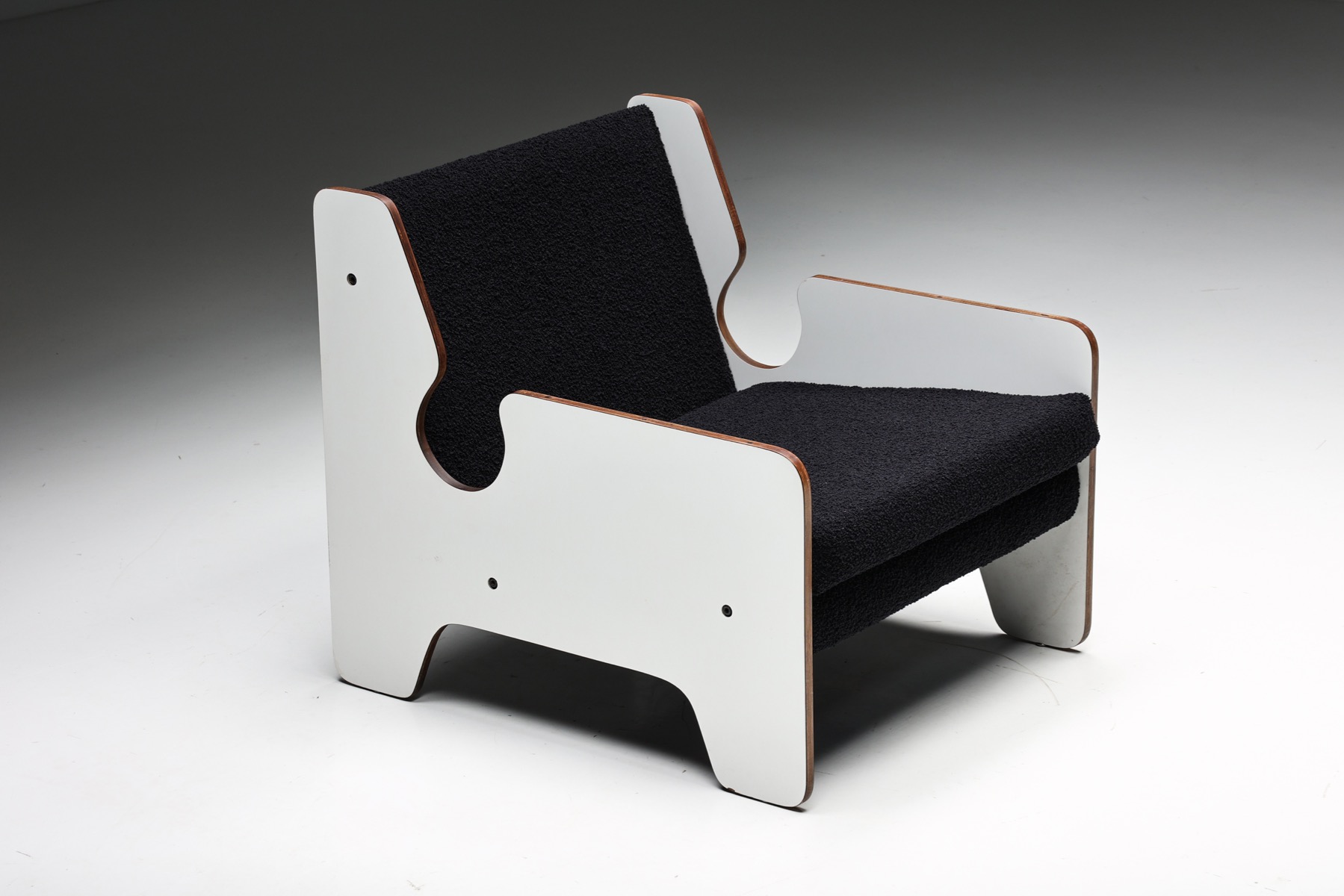 Bold black and white lounge chair in postmodern 1970s style