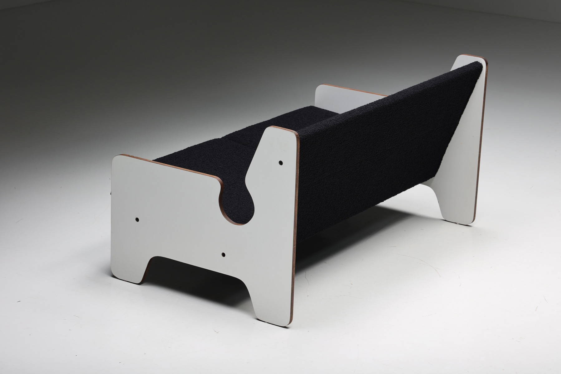 Bold black and white sofa in postmodern 1970s style