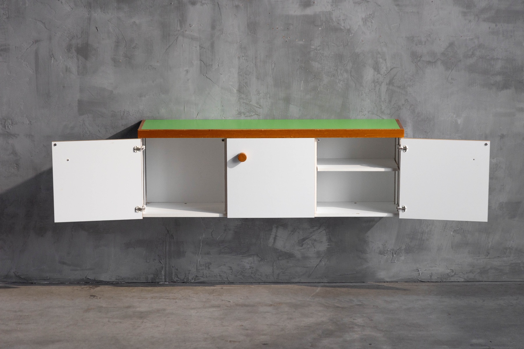 Les Arcs wall cabinet reflecting functional modernist design