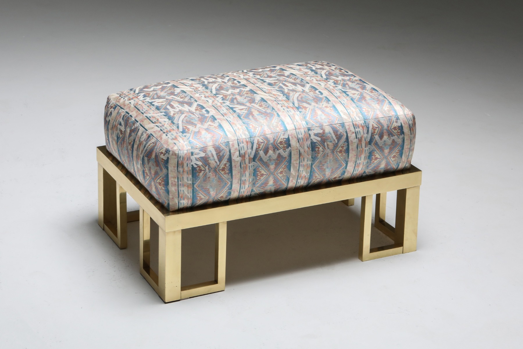 Collectible brass lounge chair and ottoman from the 1970s