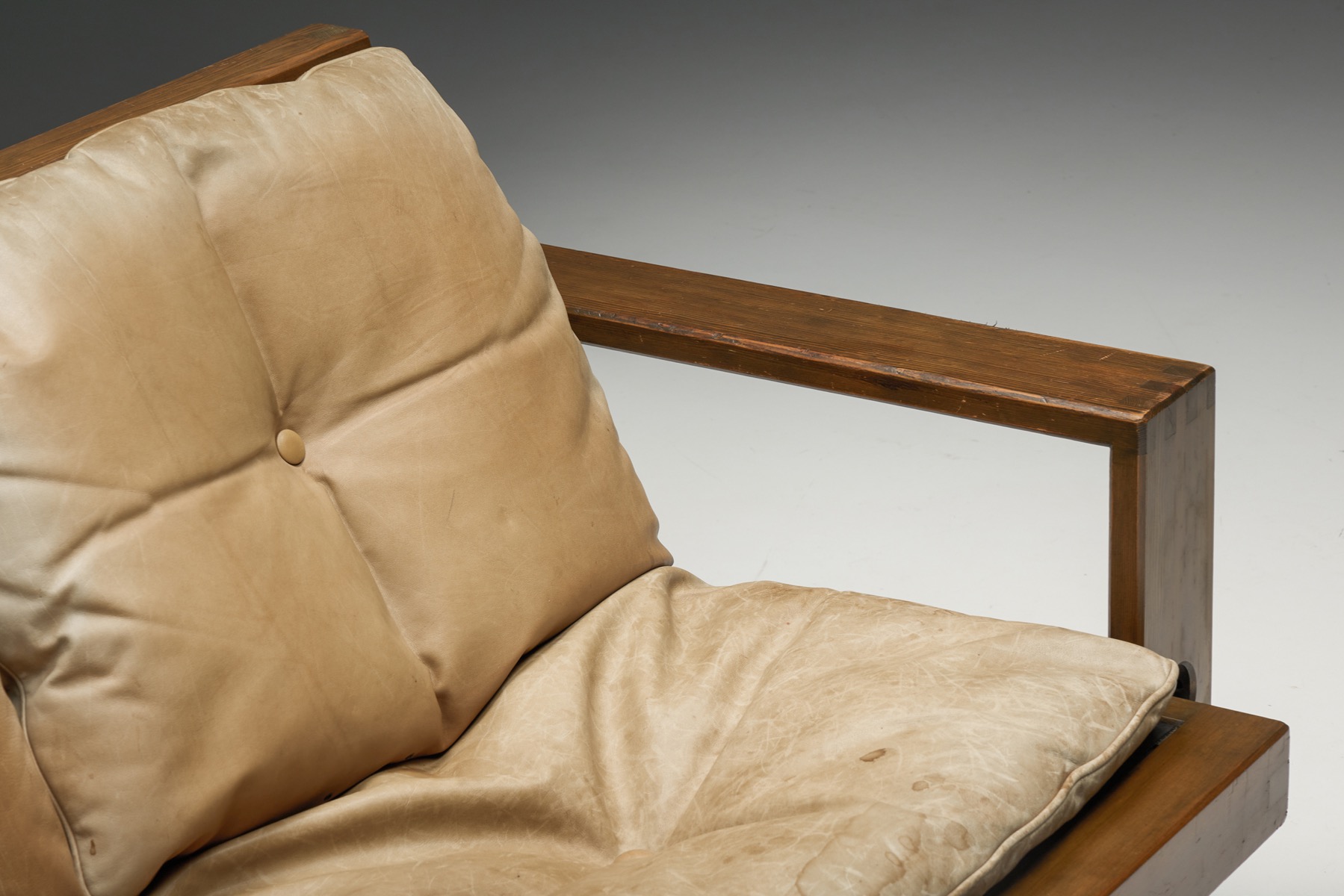 Collectible French two seater with leather cushions from the 1960s