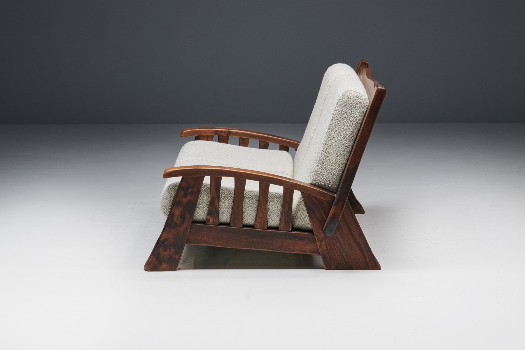 Collectible walnut sofa in boucle from the 1960s