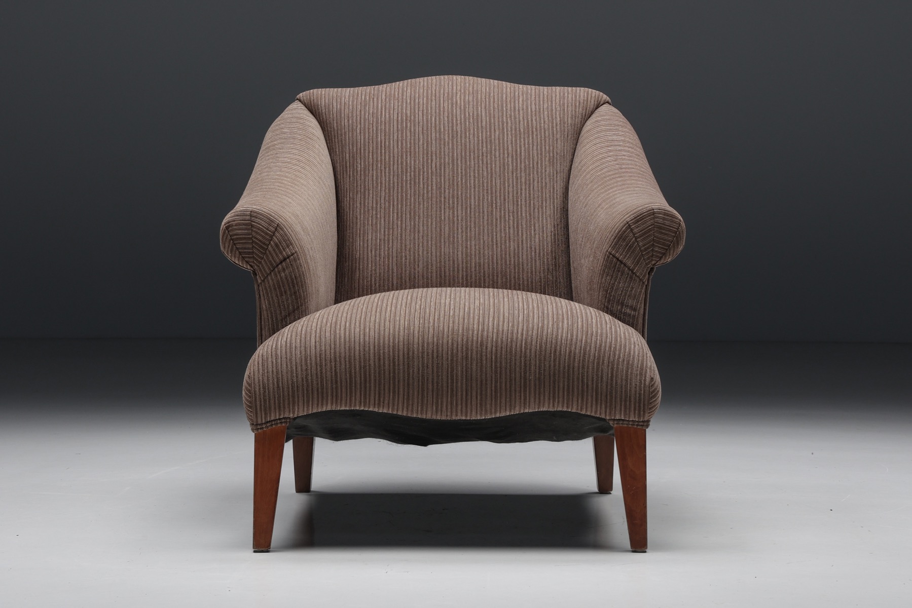 Comfortable striped armchair in mid century style