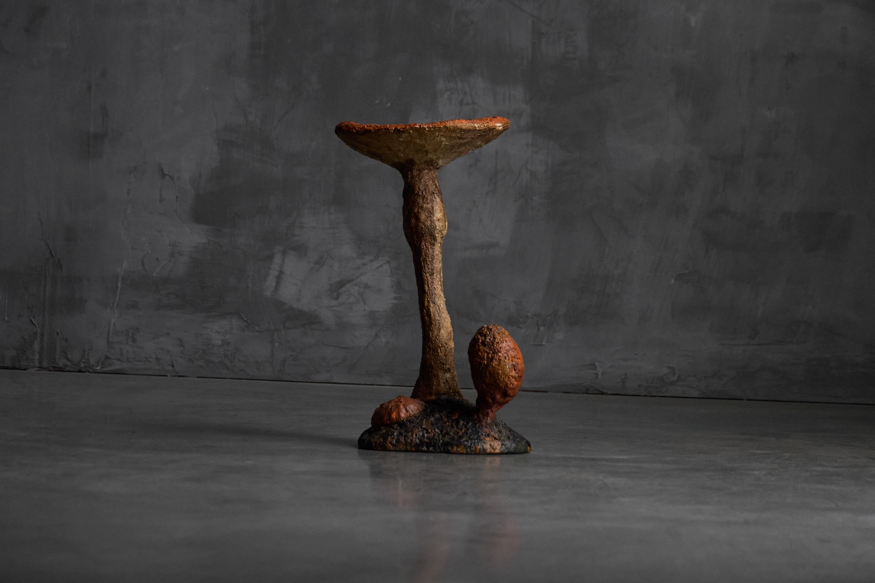 Earthy wabi sabi mushroom sculpture with organic presence