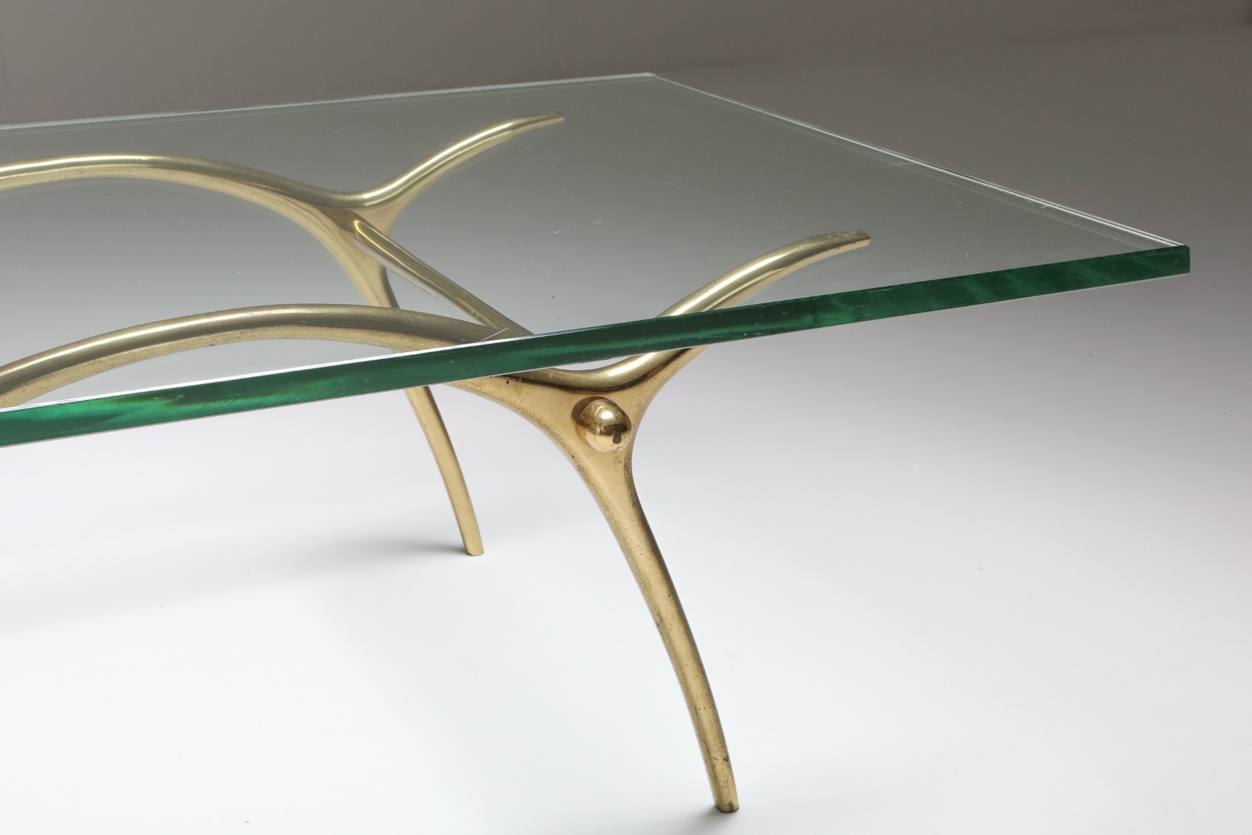 Elegant Hollywood Regency coffee table in bronze design
