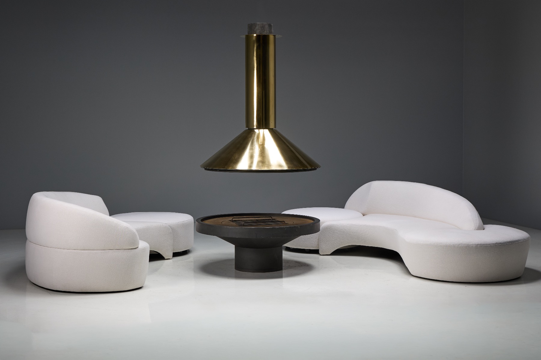 European freestanding brass fireplace with modernist form