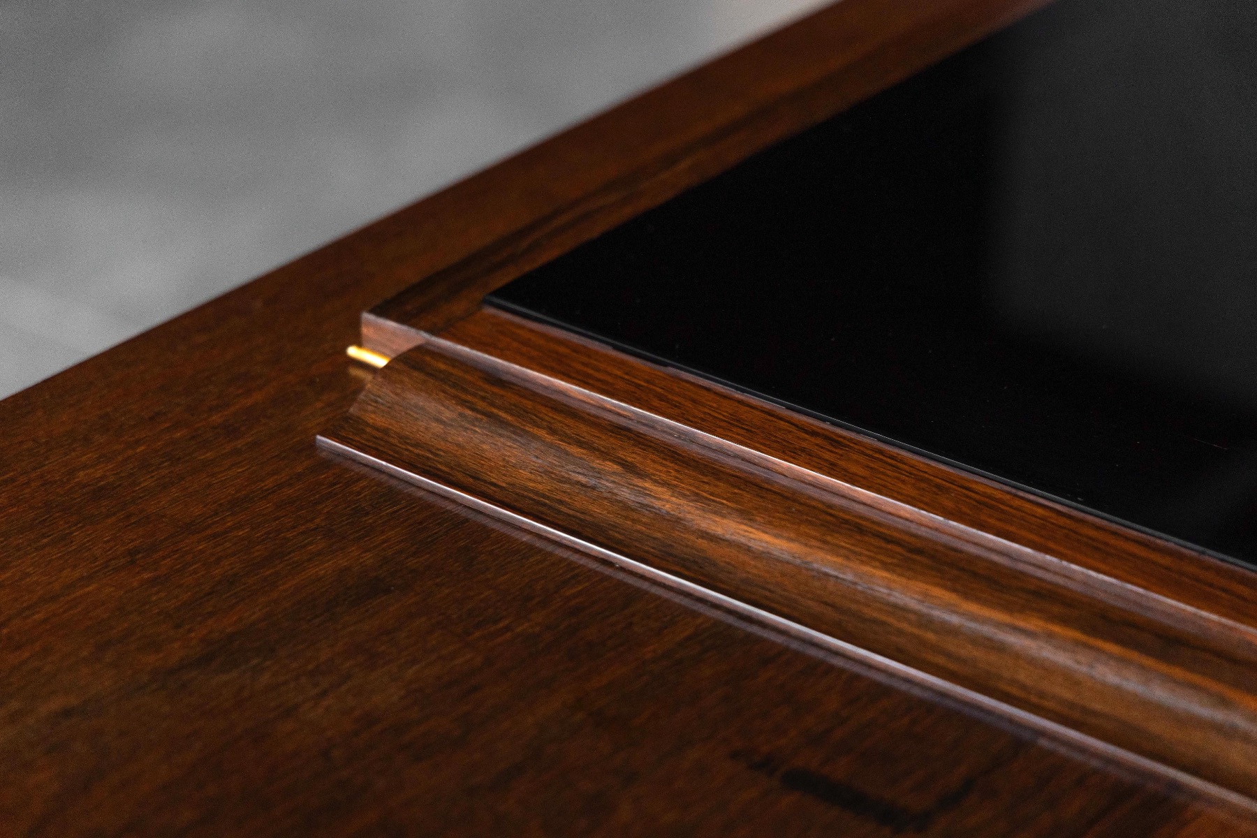 Art Deco sideboard featuring a sculptural walnut base