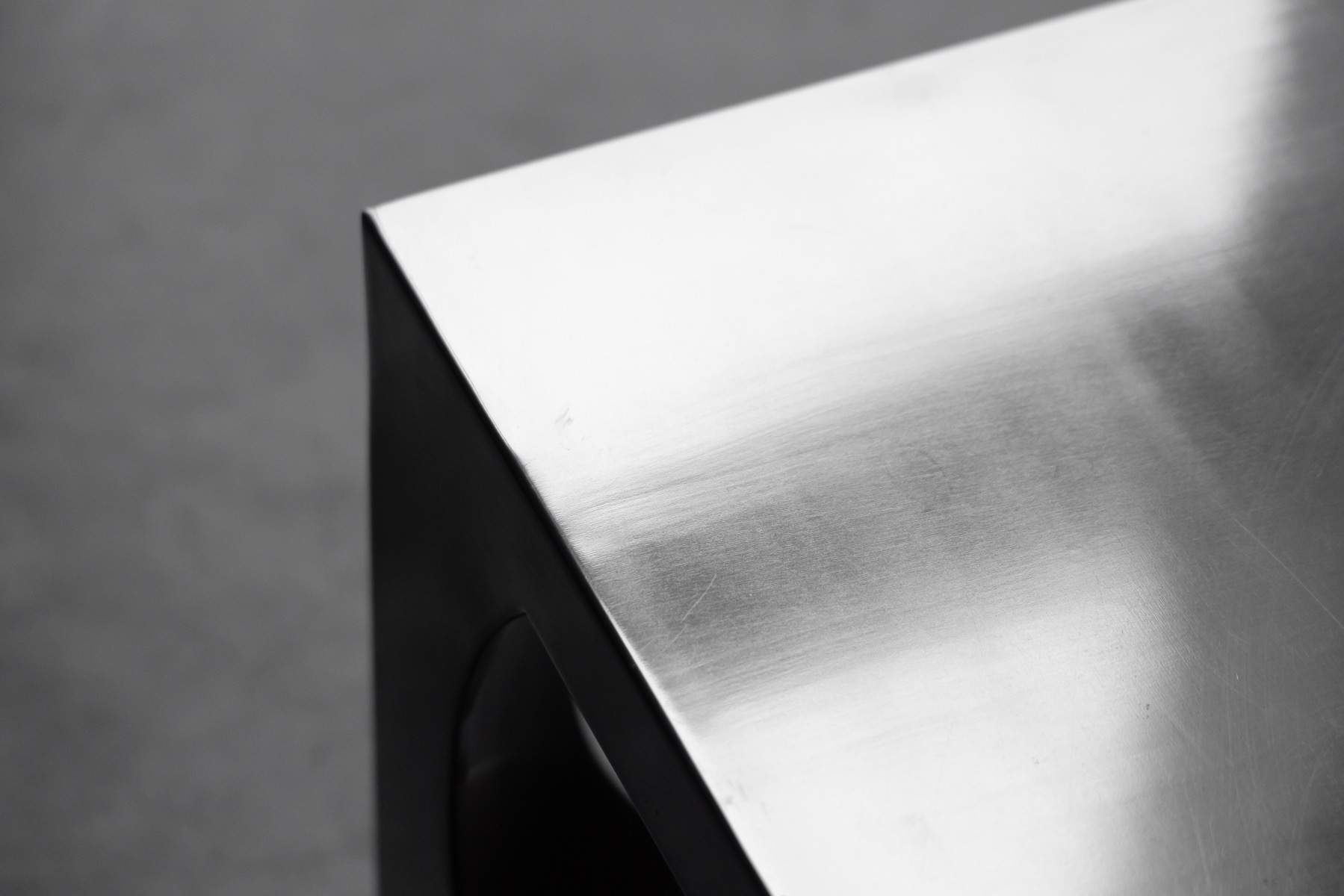 Industrial modernist aluminum side table with geometric form