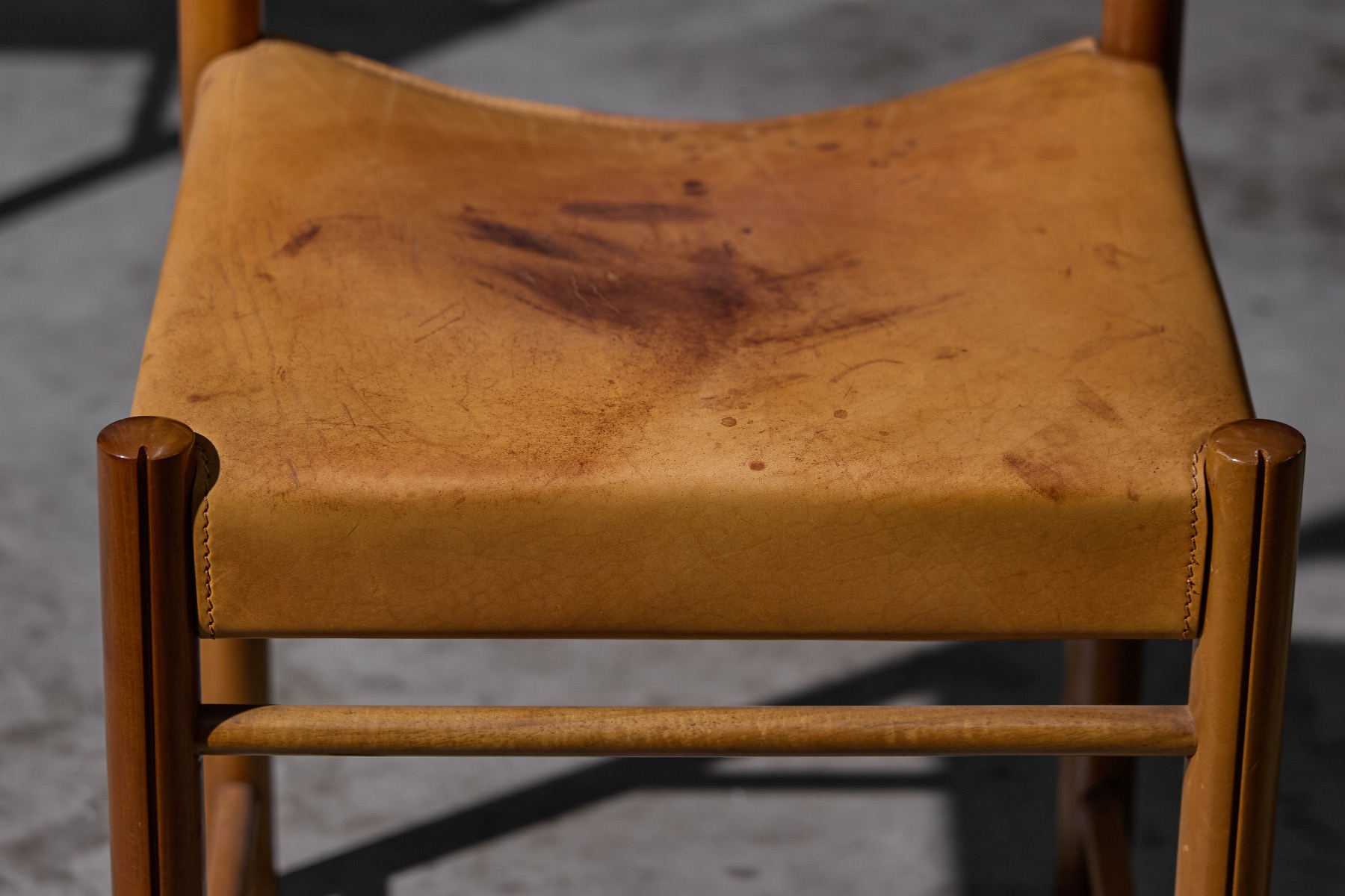 Classic mid century dining chairs in cognac leather