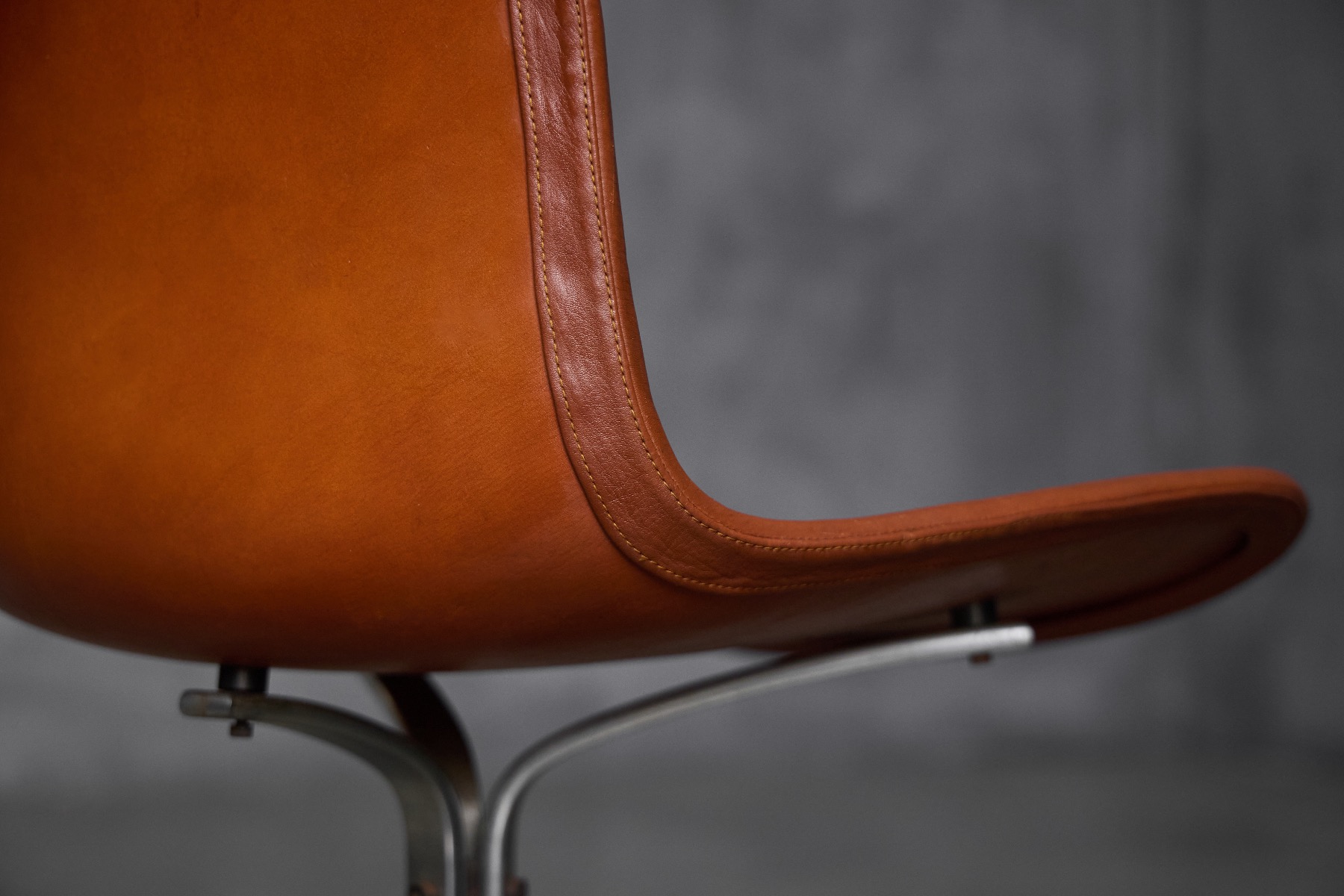 Iconic PK9 chair reflecting Danish modernism
