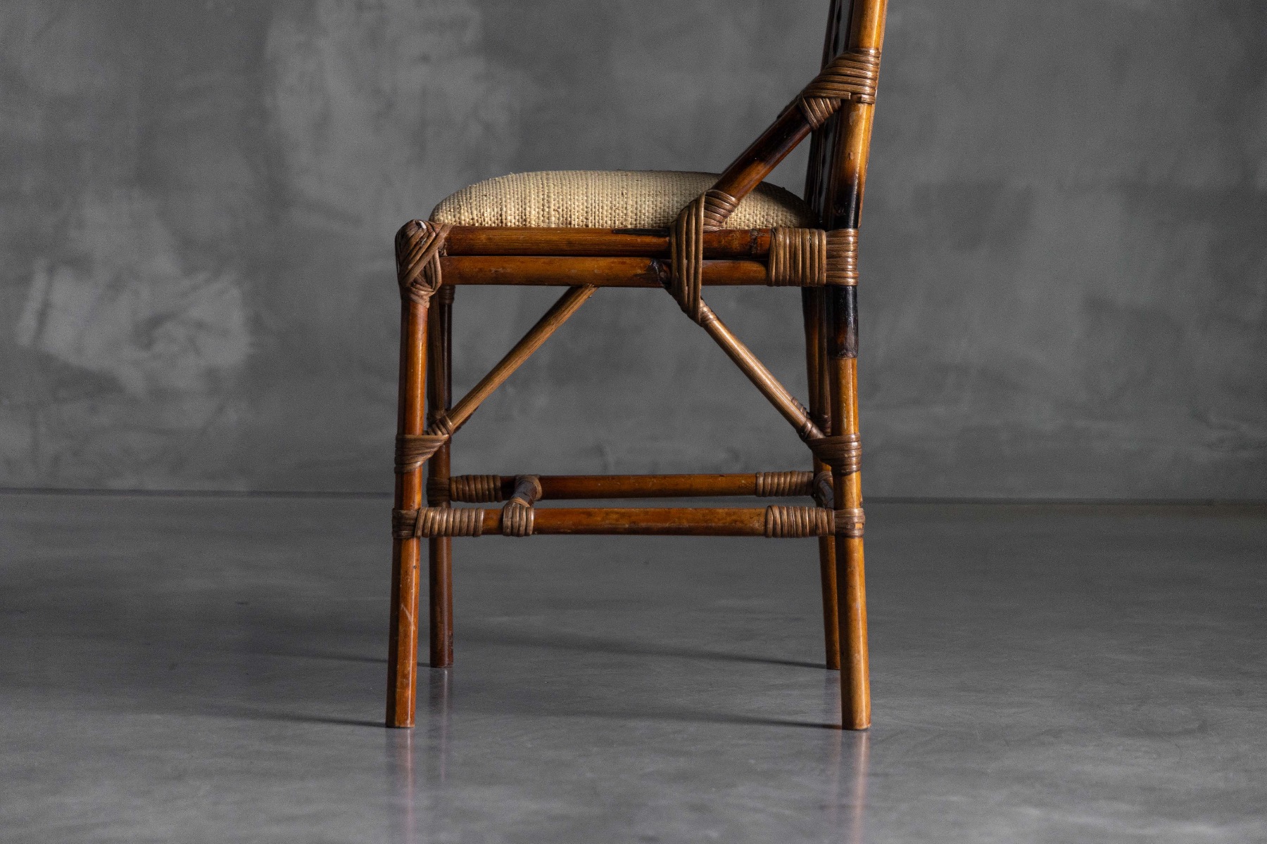 Modernist high back bamboo and brass chair