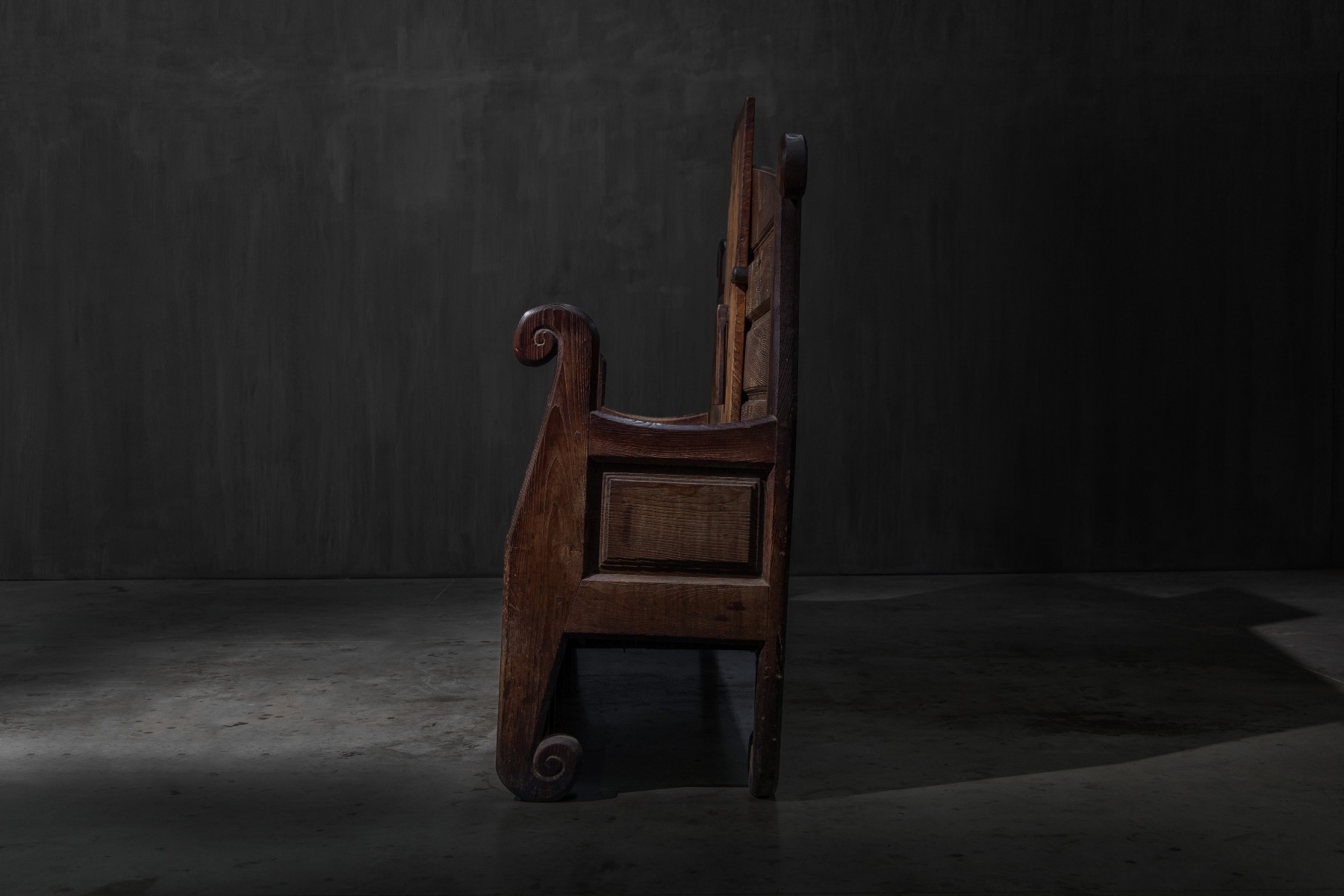 Vernacular Alpine monastery bench with practical design