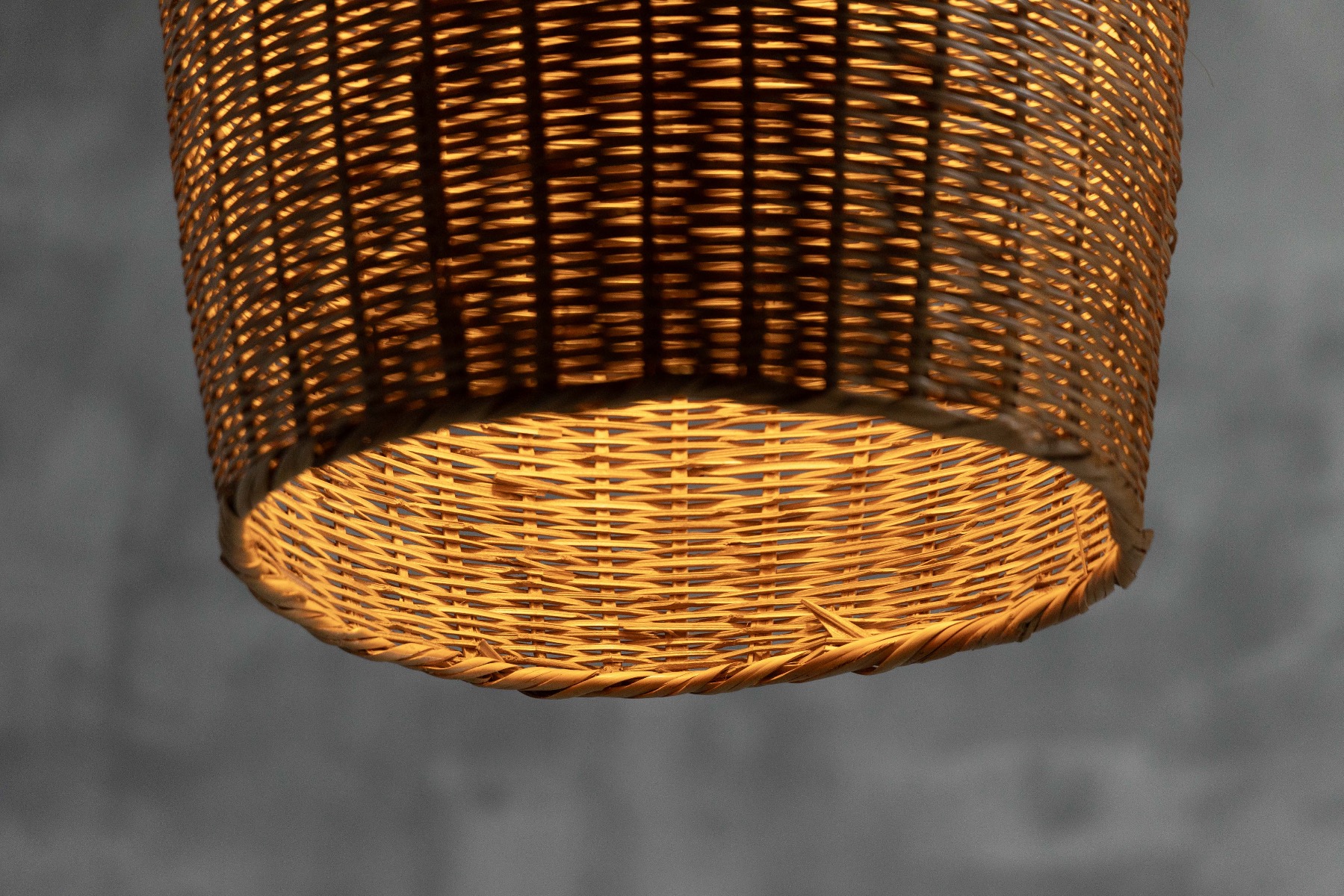 Natural rattan hanging lamp with organic silhouette