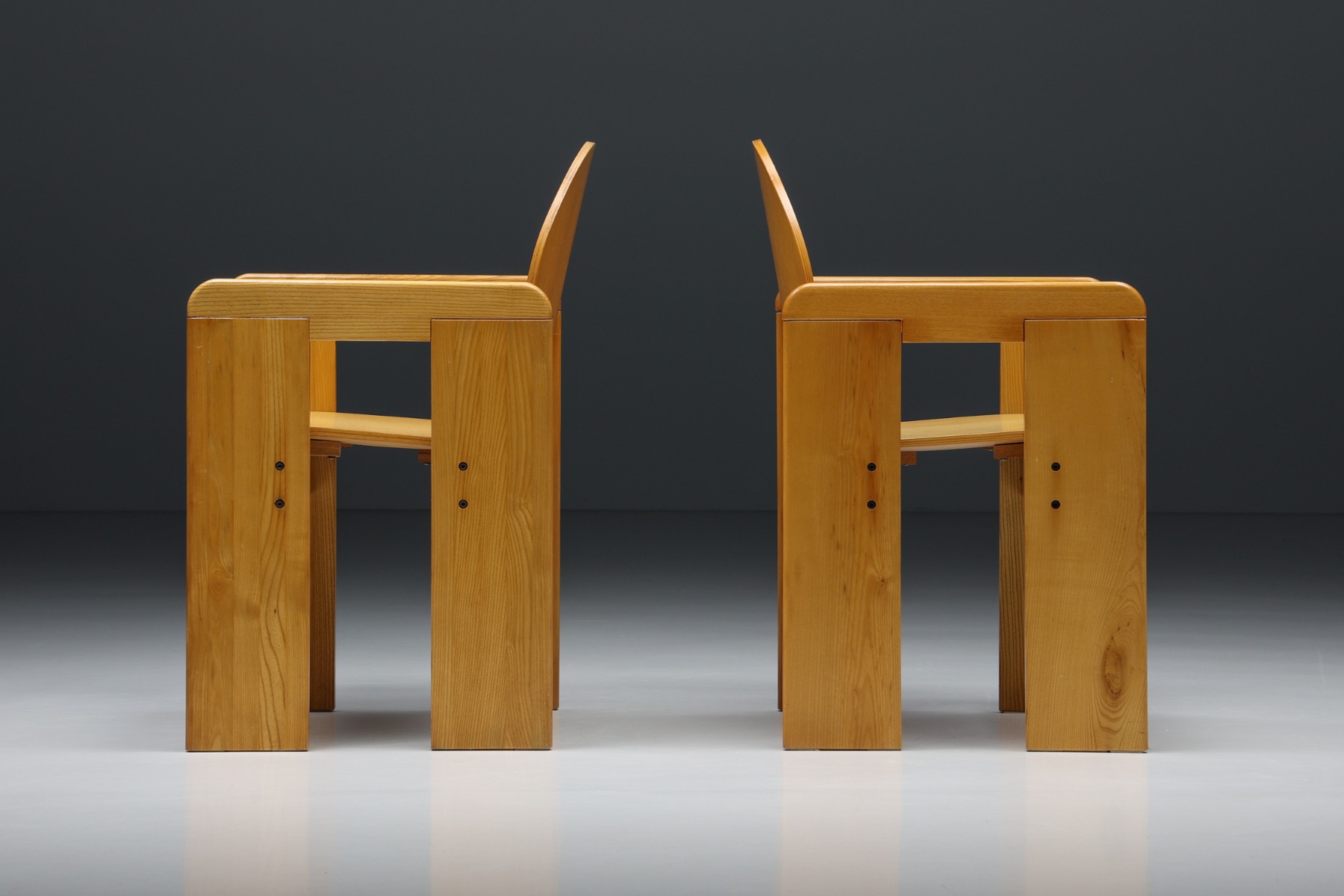 Natural wood dining chairs by Afra and Tobia Scarpa from the 1970s