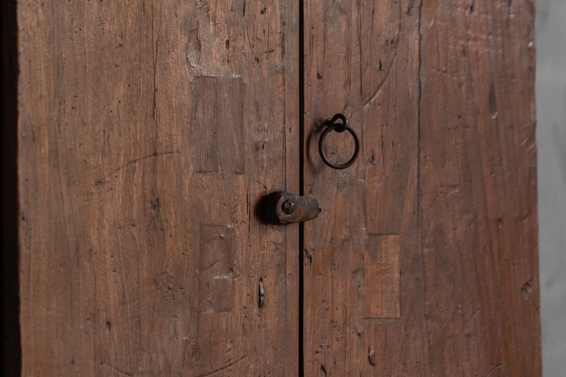 Primitive wall cabinet with vernacular proportions