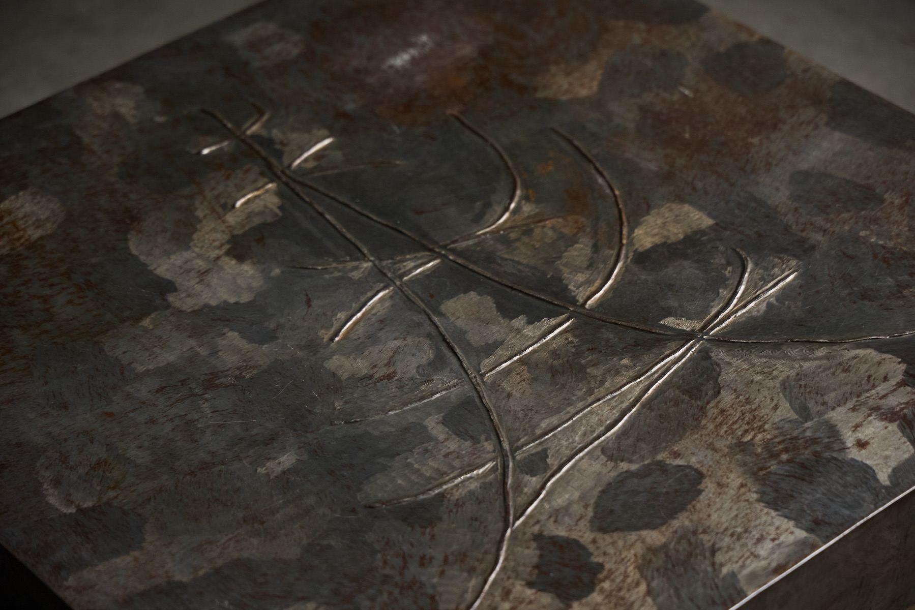 Heavy steel coffee table with industrial character