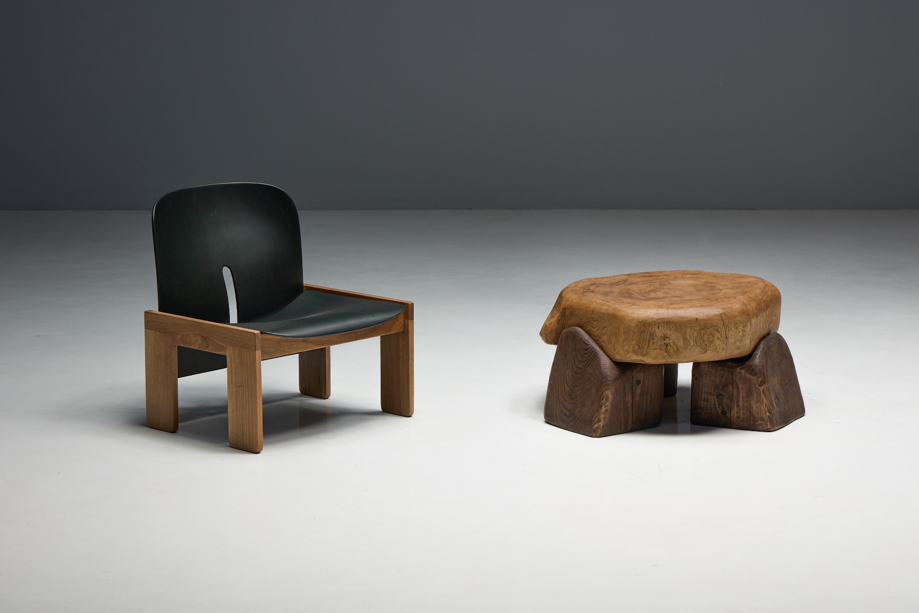 Brutalist coffee table featuring raw carved surface