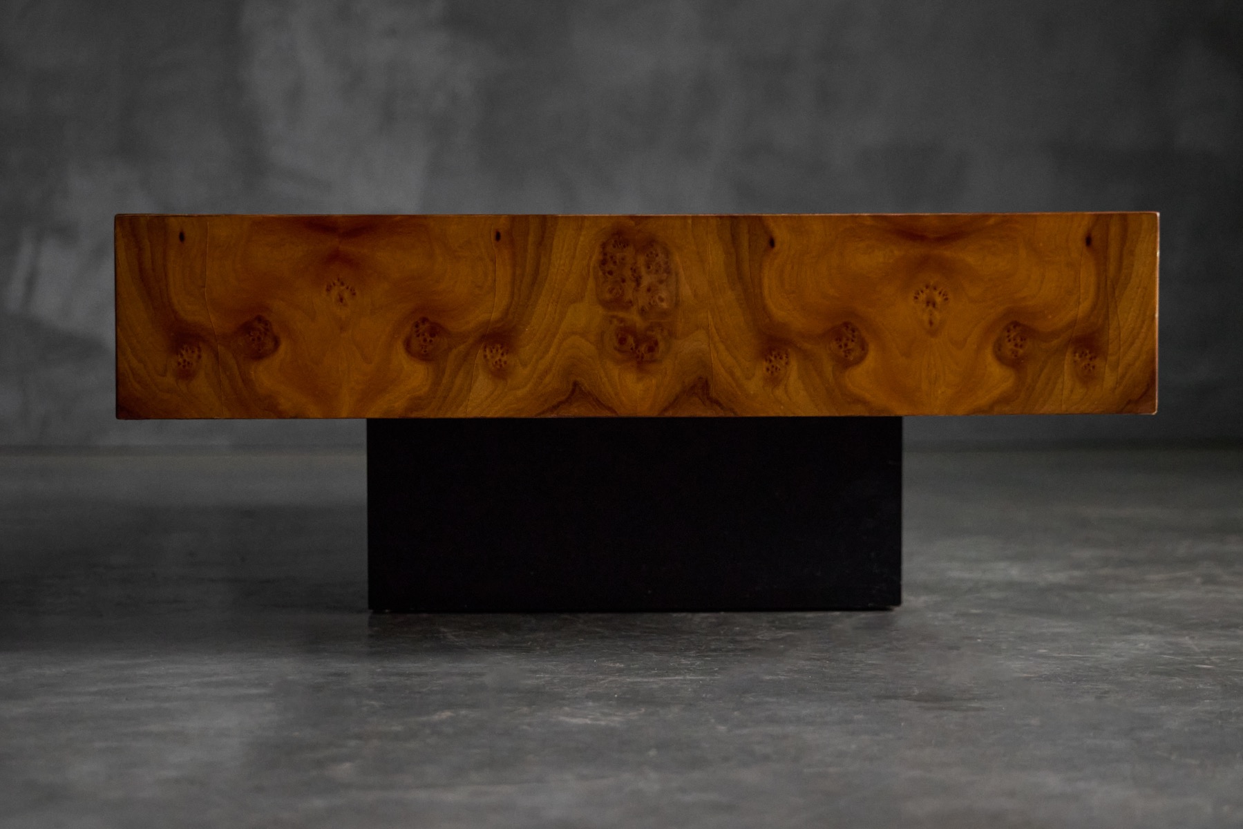 Sculptural burlwood coffee table reflecting 1970s luxury design