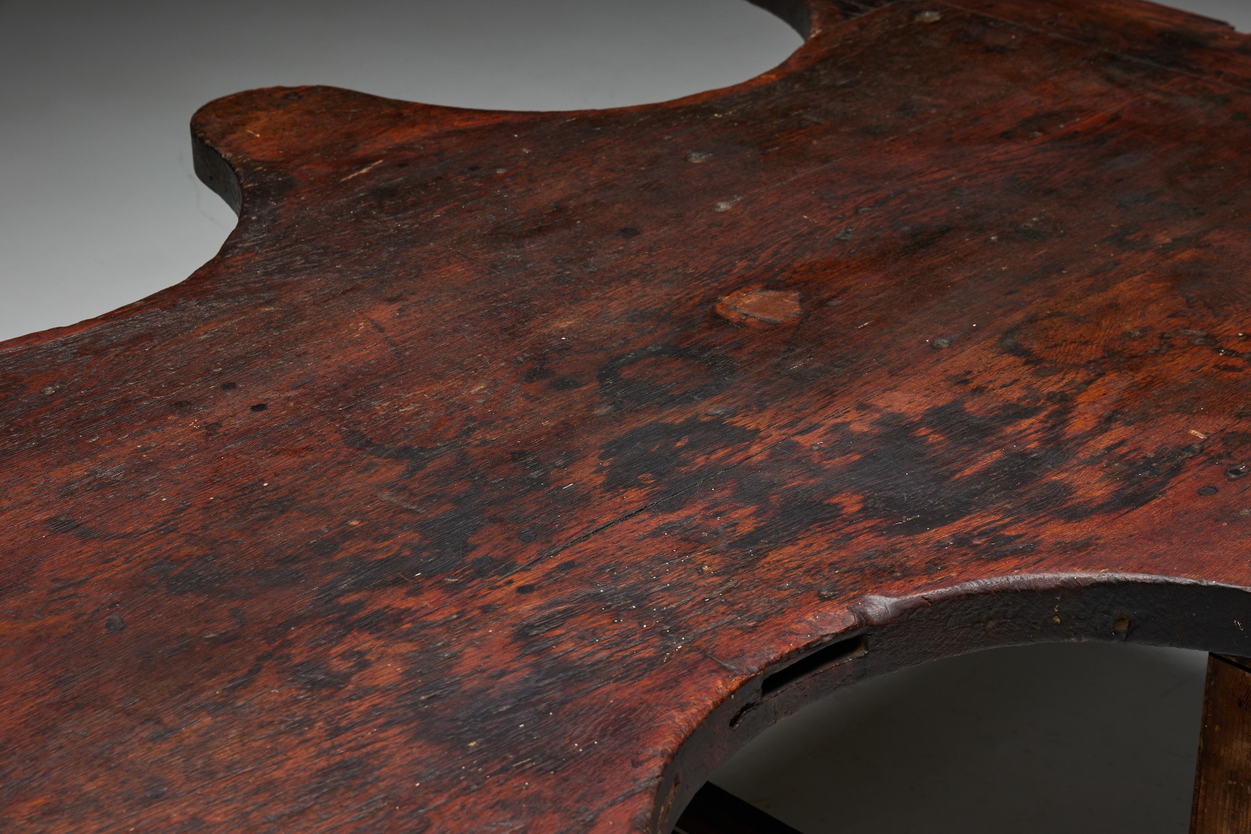 Sculptural free form wood table in rustic style