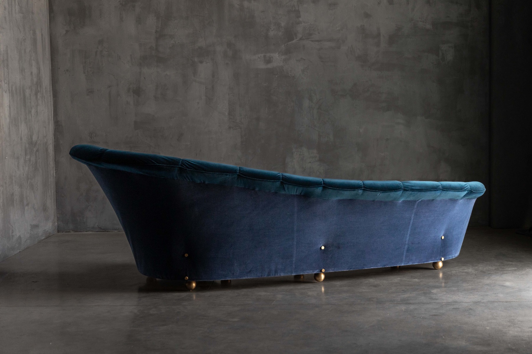 Seventies curved velvet lounge sofa with bold silhouette