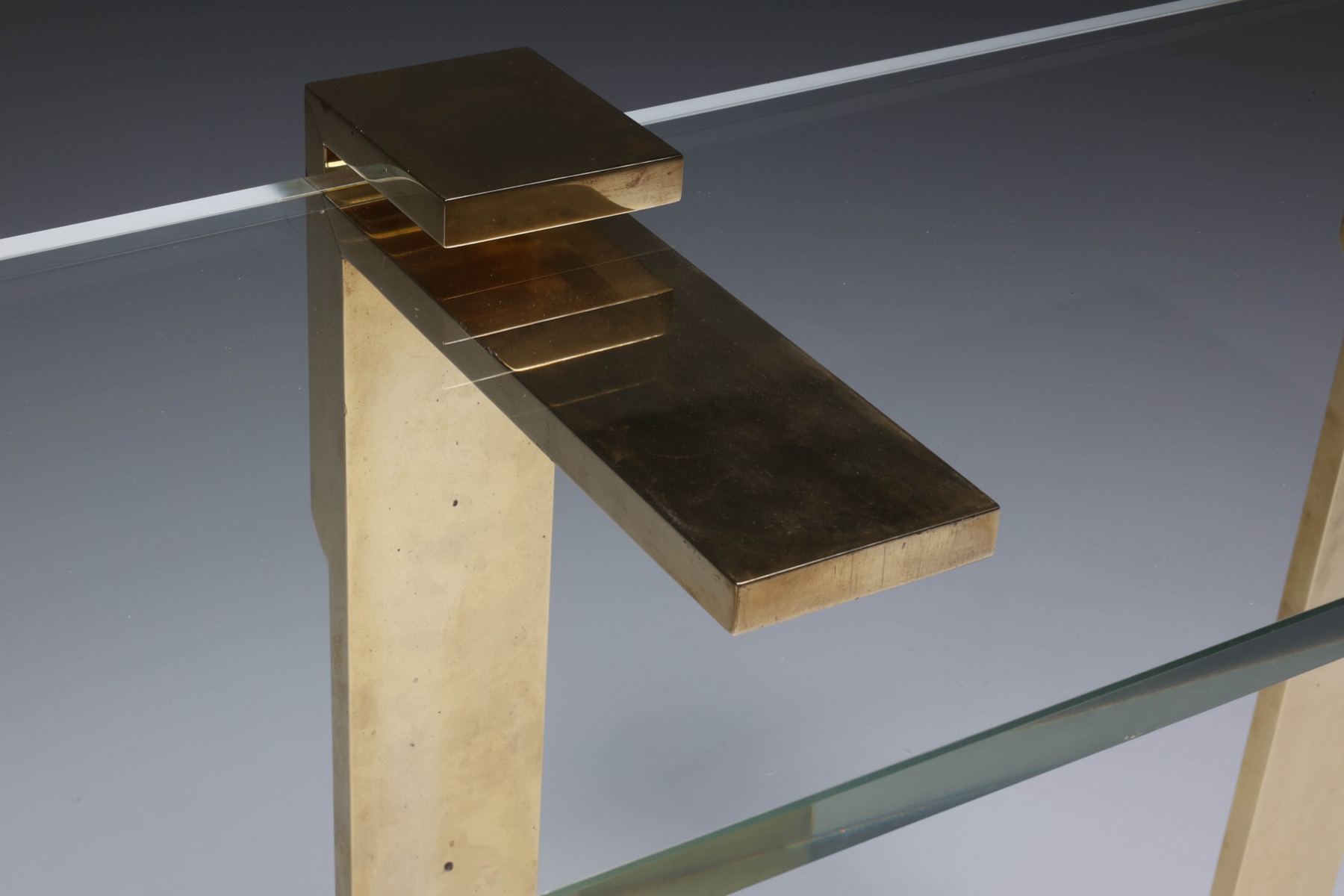 Sleek brass side table in Regency modern style