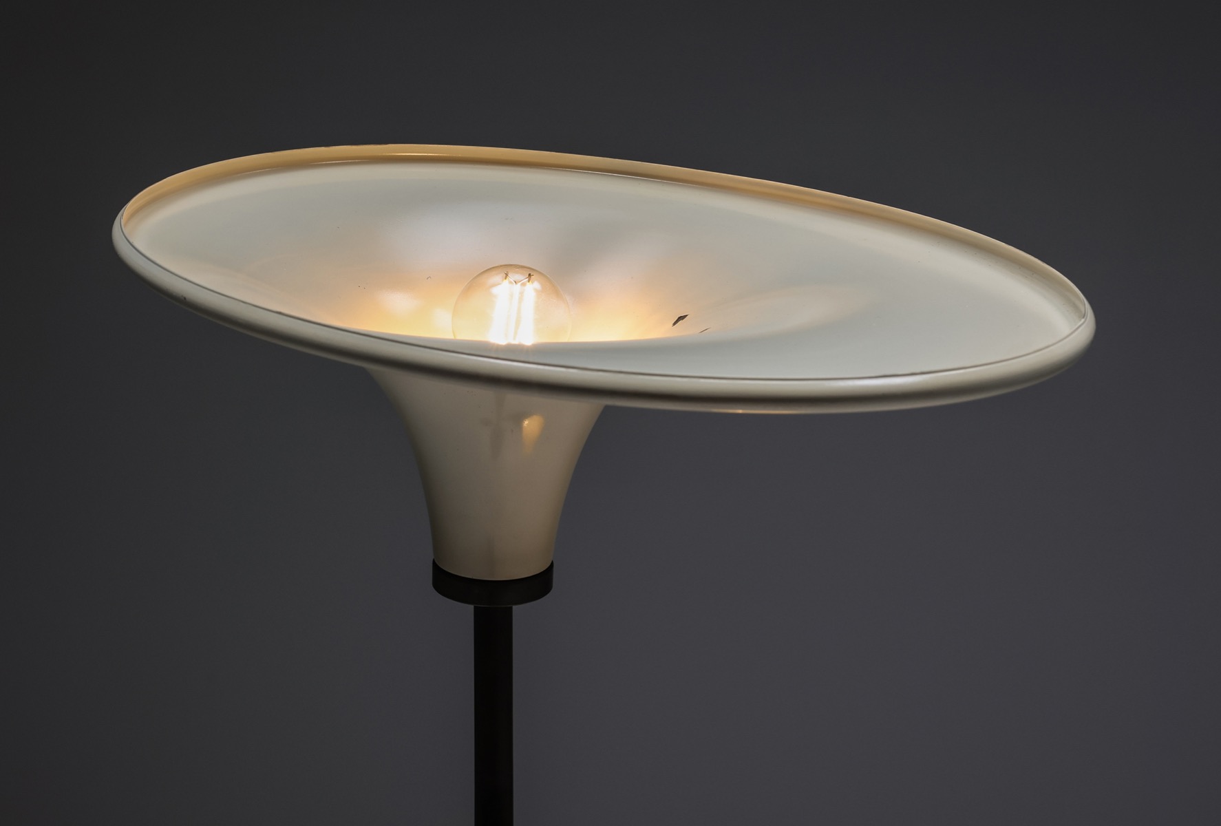 Sleek space age floor lamp in yellow and black design
