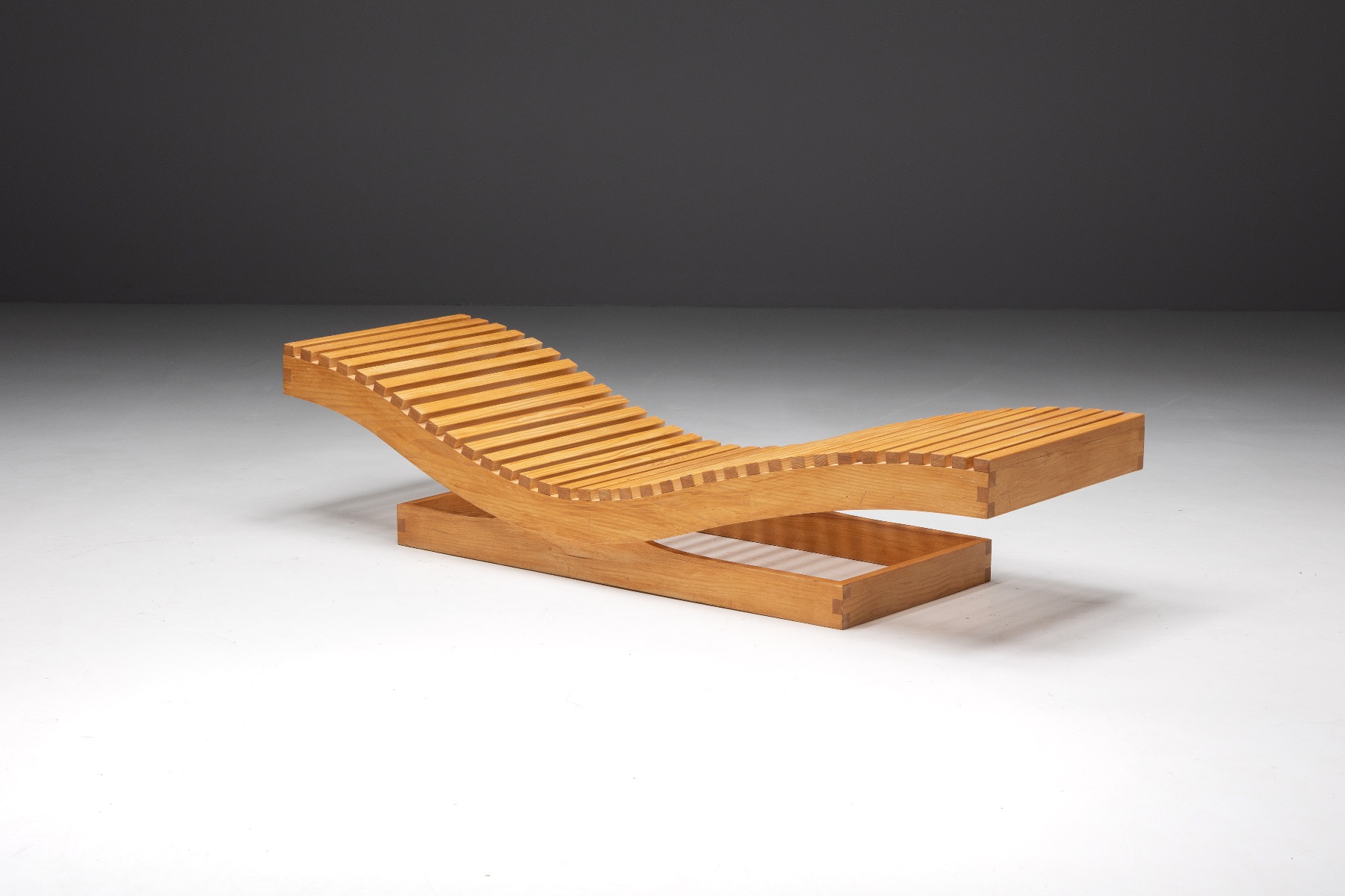 Solid wood lounge chair by Maison Regain