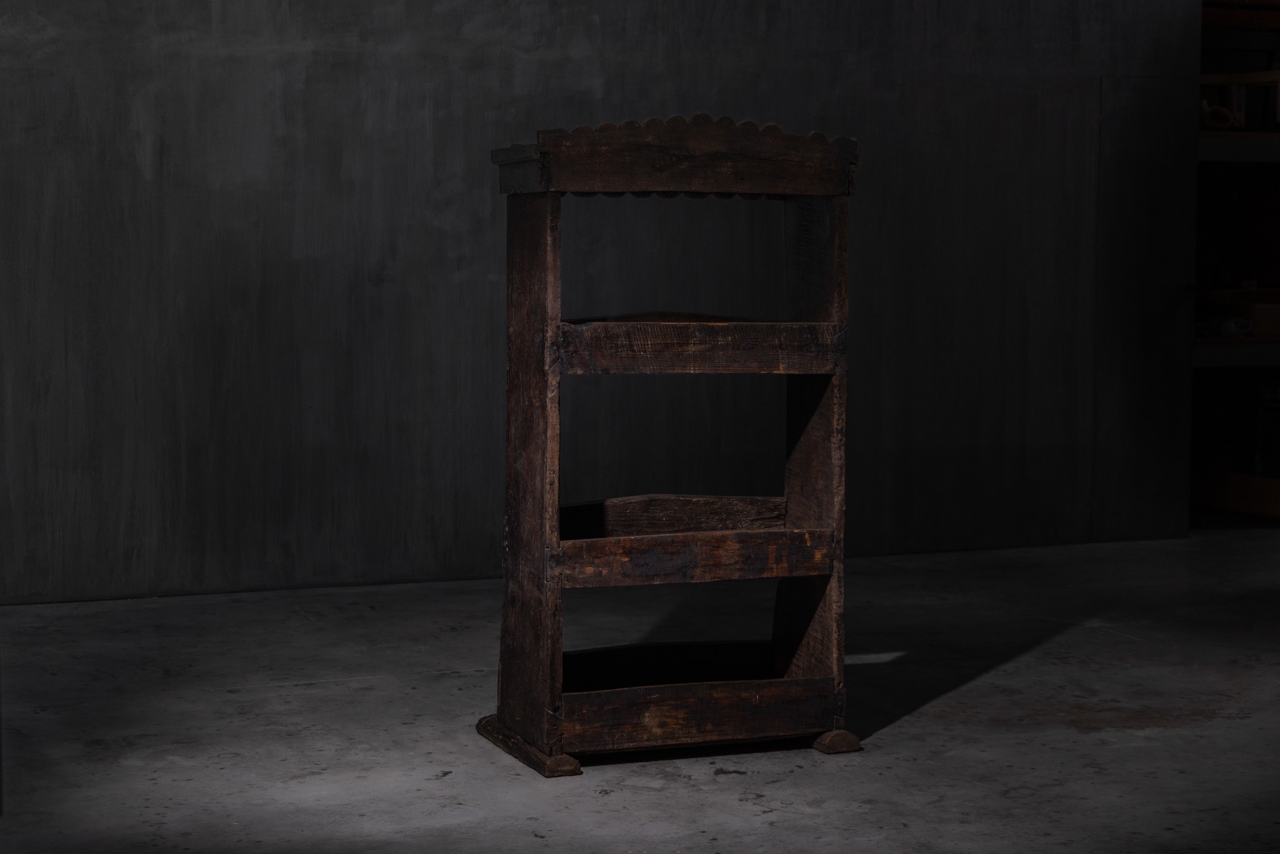 Solid wood antique bookcase reflecting traditional craftsmanship