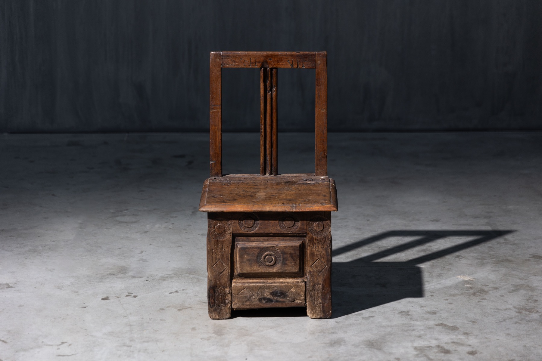 Heritage 19th century wooden chair with functional design