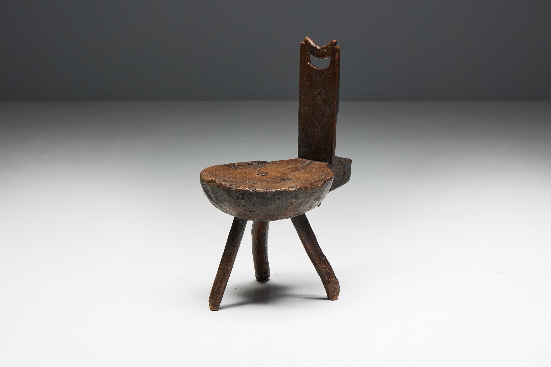 Traditional alpine tripod seating in wood