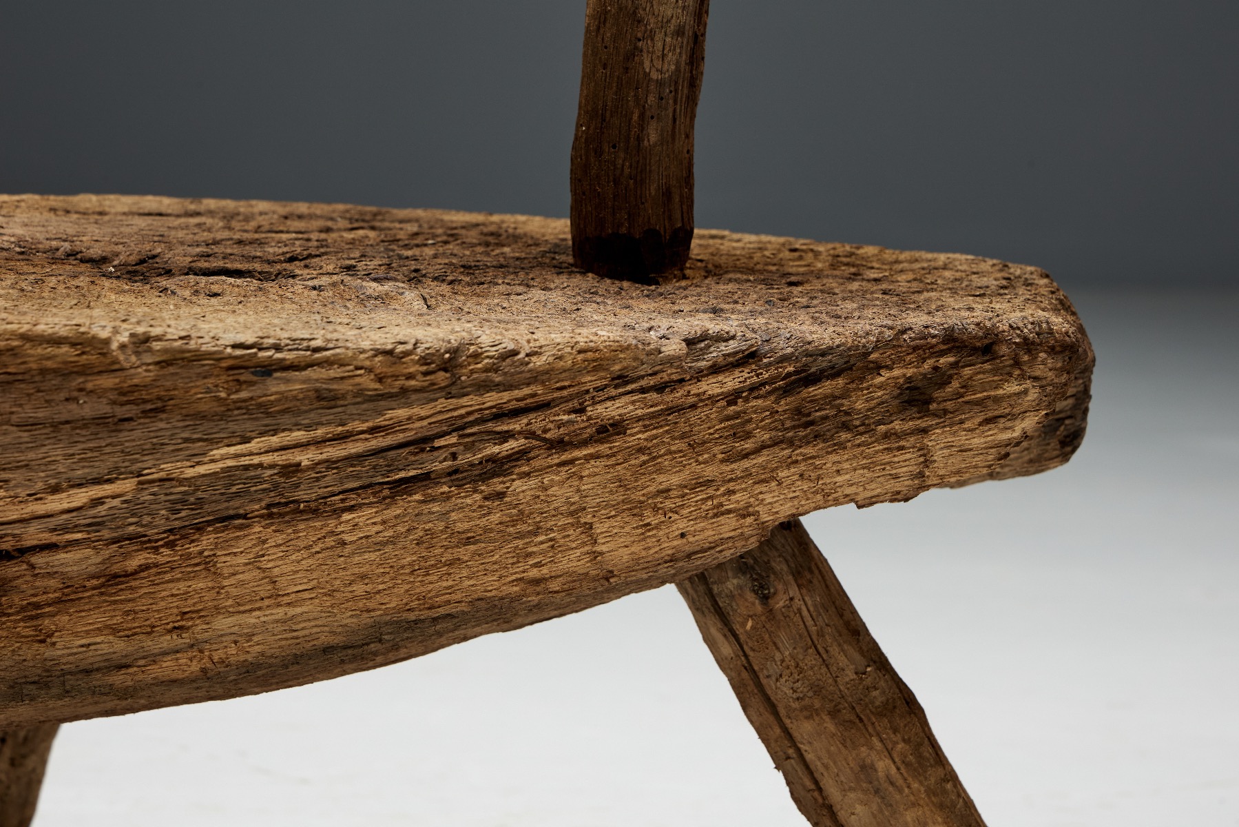 Traditional folk art tripod chair in solid form
