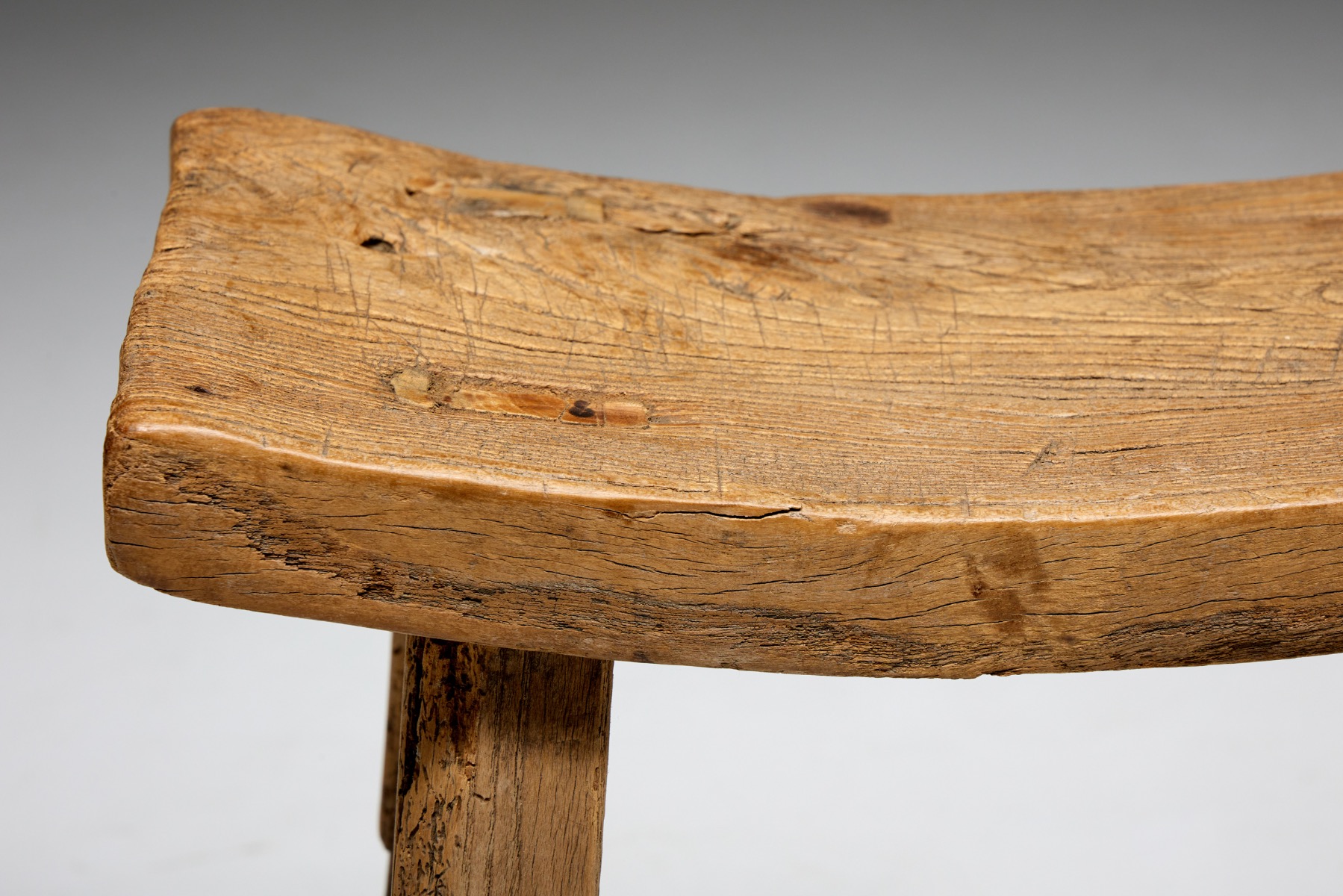 Traditional folk style stool in solid wood