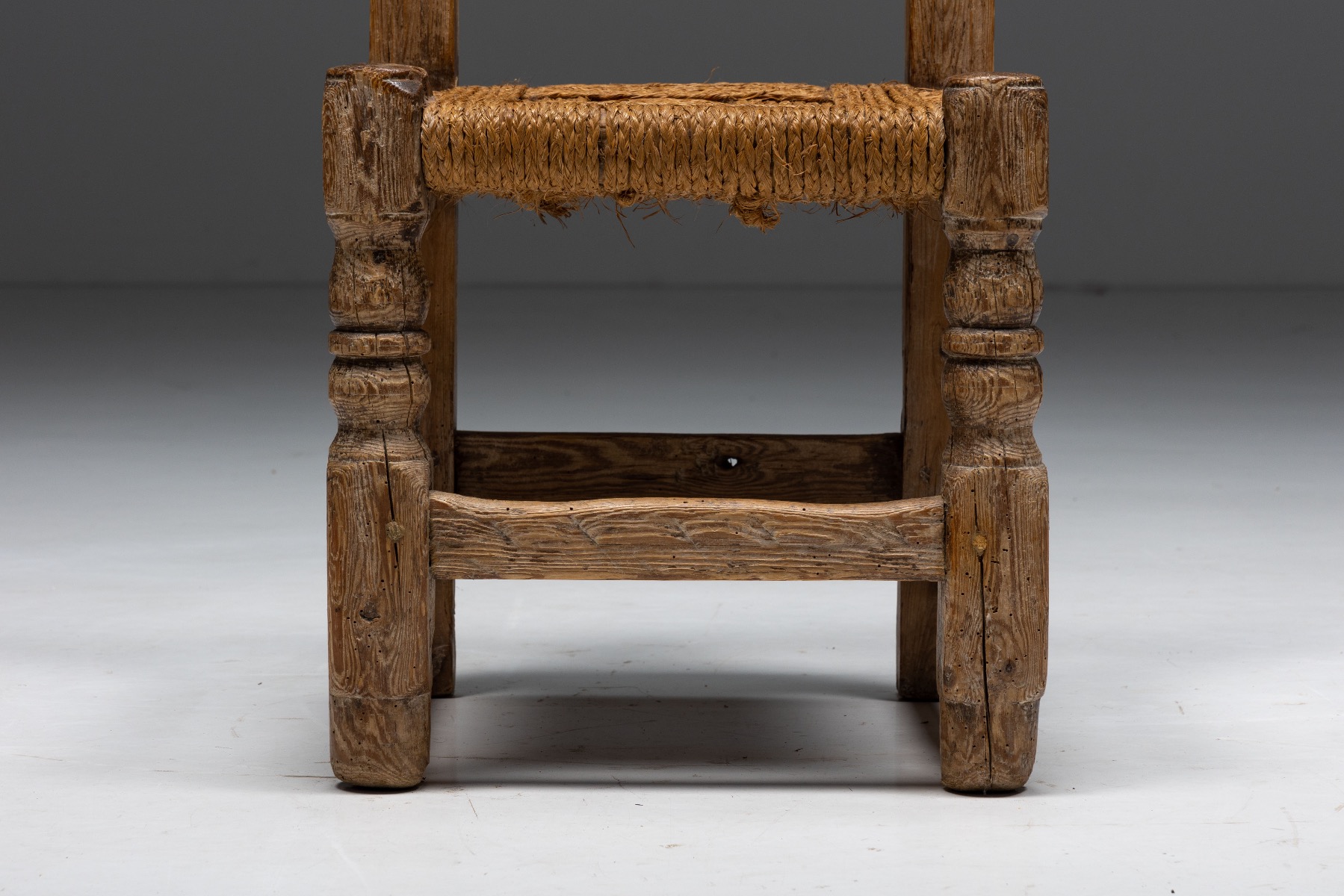Traditional wooden dining chairs with woven seats