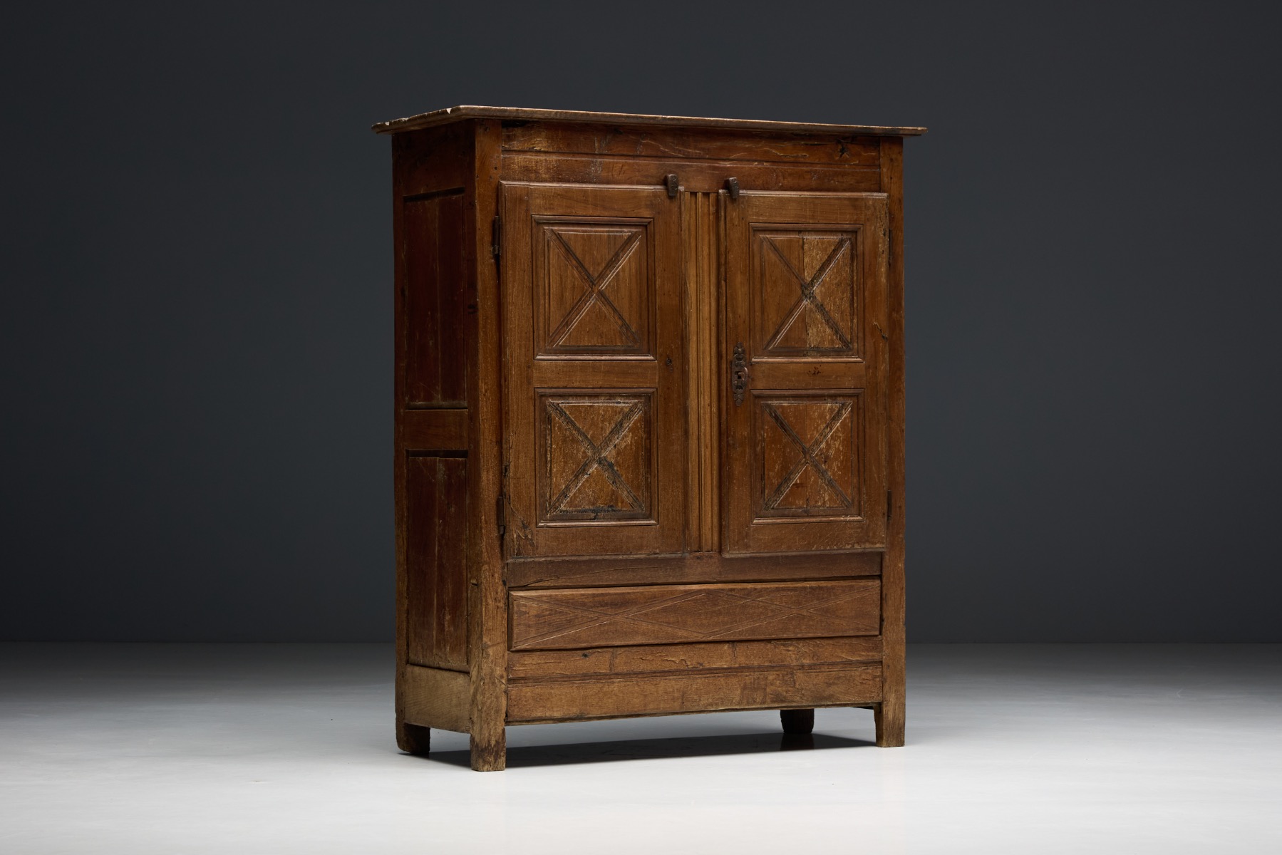 Alpine cabinet with aged wooden doors