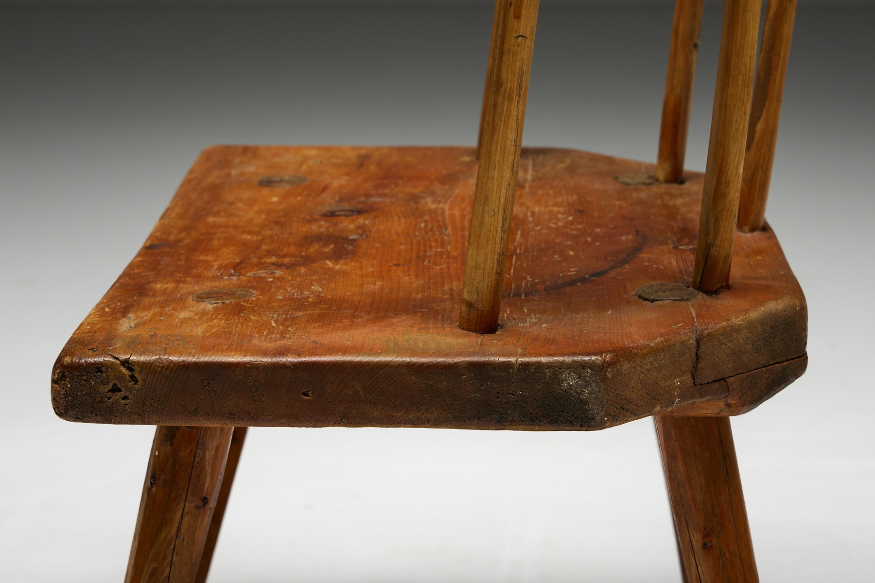 Antique alpine armchair in Tyrolean style wood