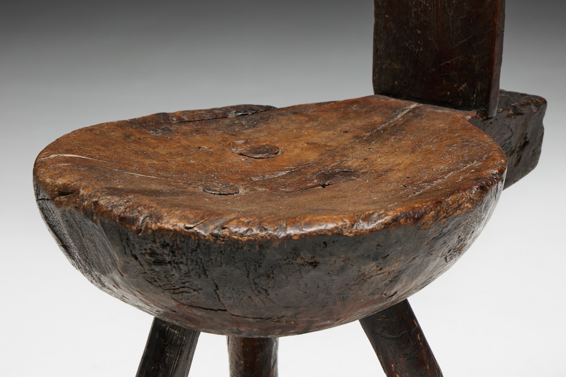 Antique rural alpine chairs with tripod base in wood