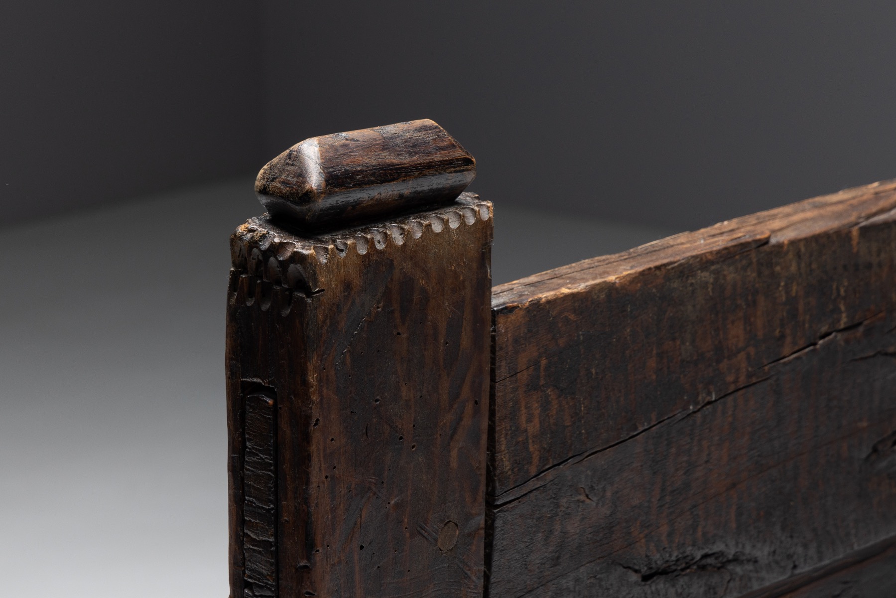 Antique rural bench in art populaire wood