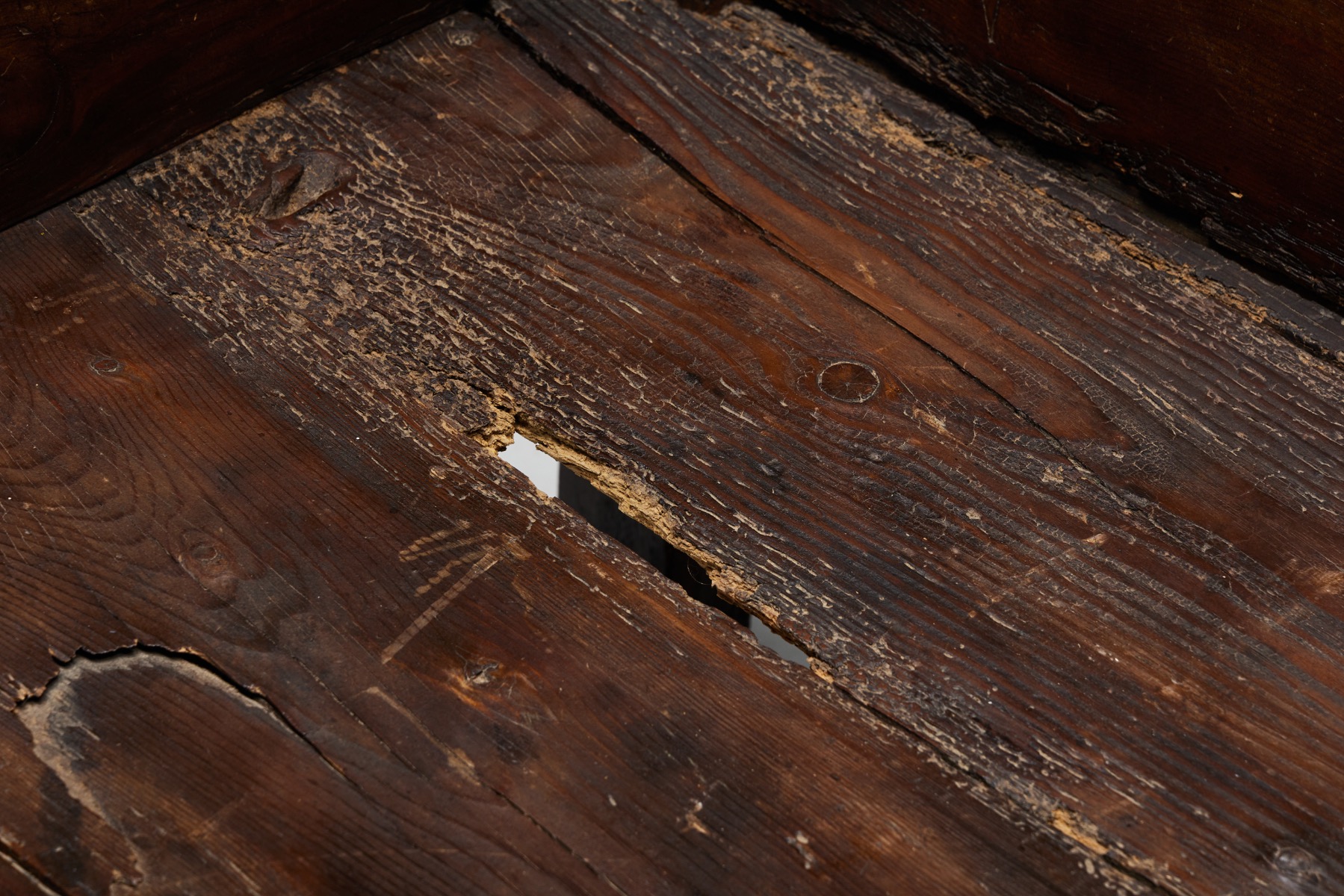 Antique rural bench in art populaire wood