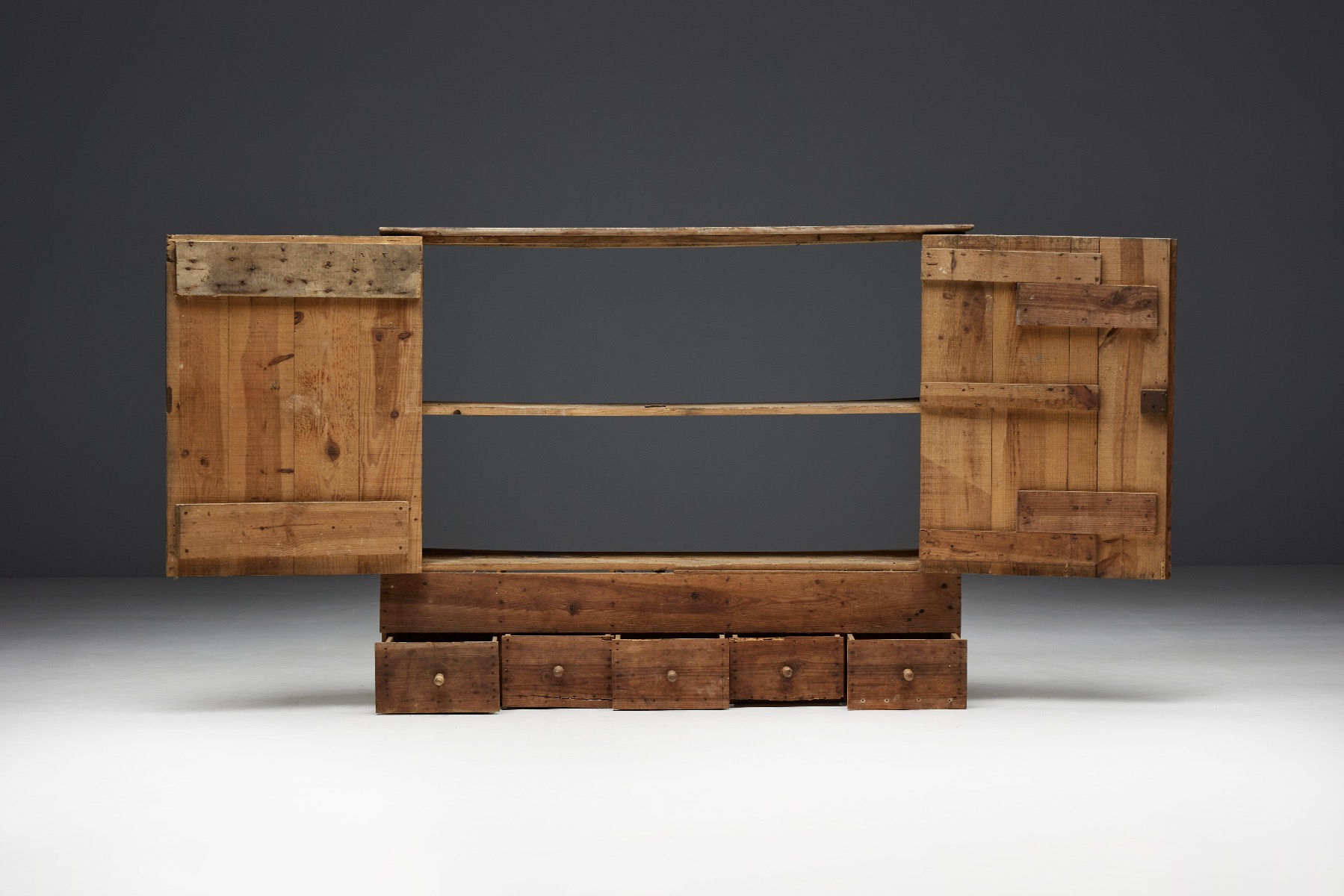 Antique rural cupboard in travail populaire wood