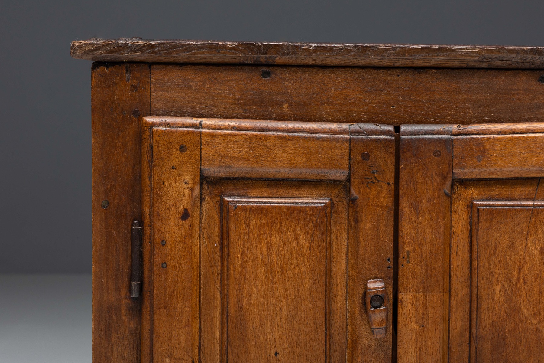 Antique rural cupboard in travail populaire wood