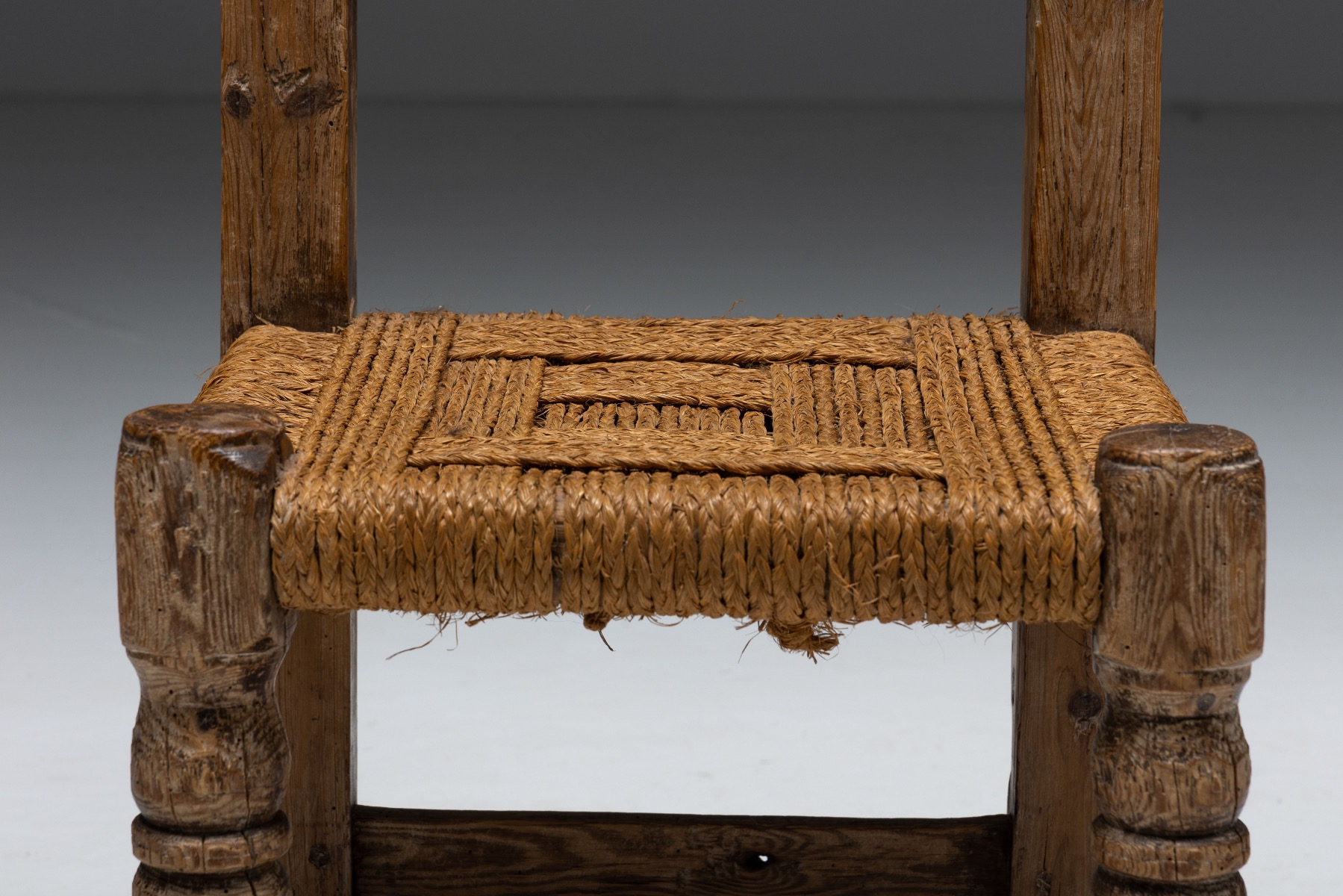 Antique rustic dining chairs with straw seats in wood