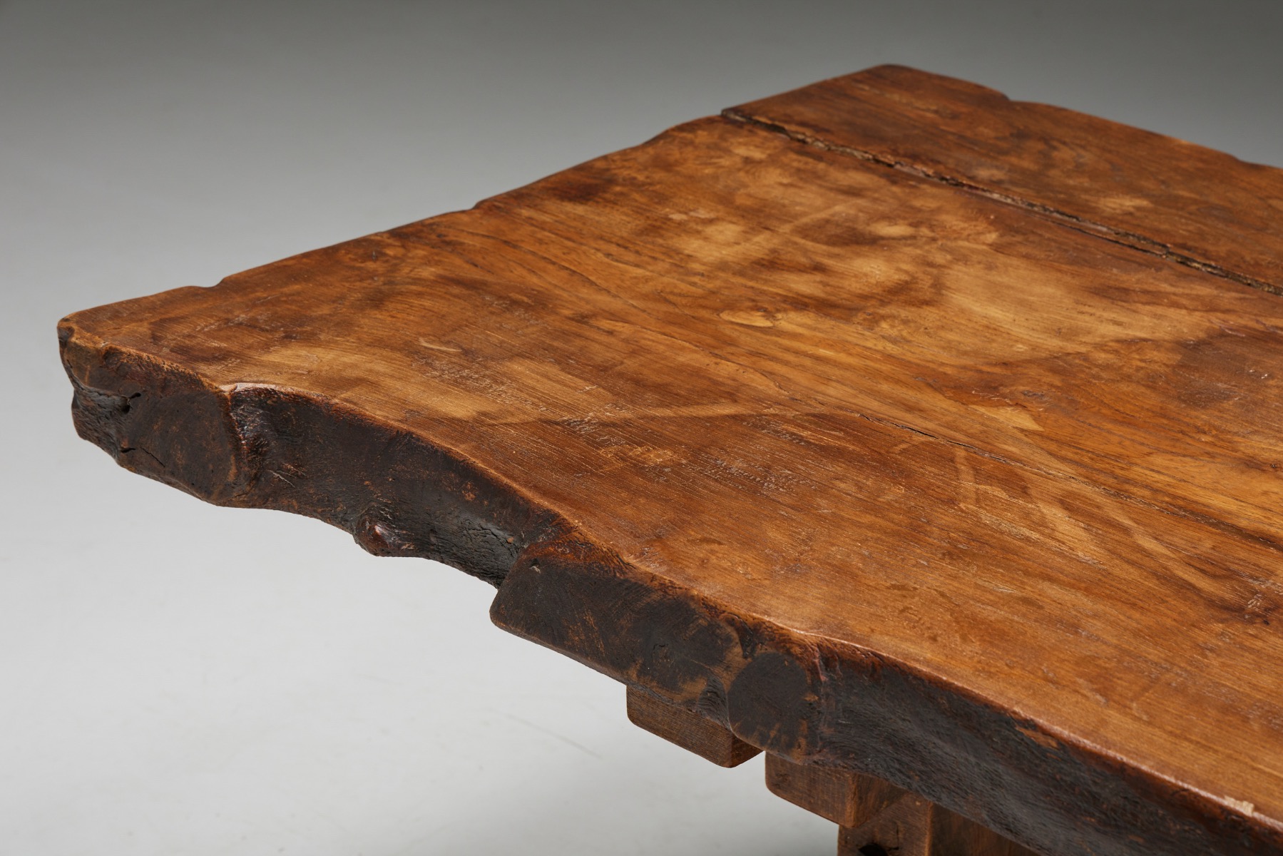 Antique rustic dining table in brutalist design