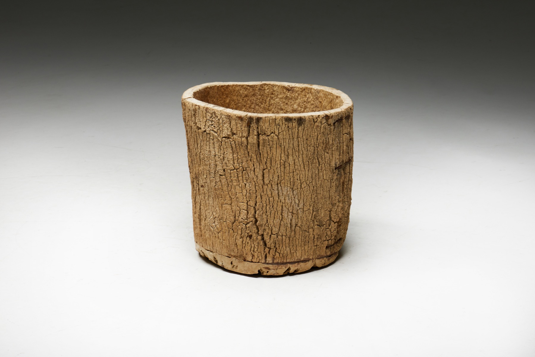 Antique rustic tree trunk container in wood