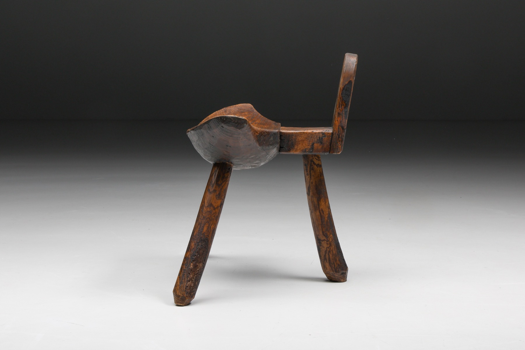 Antique style tripod stool in wabi sabi look